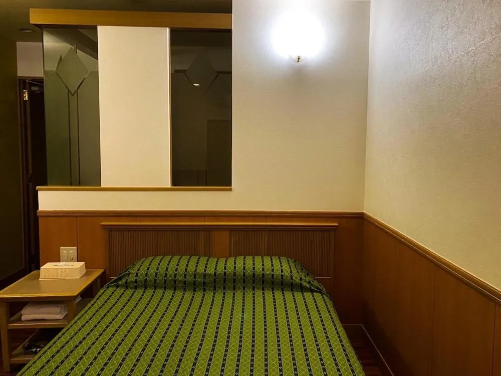 Photo of the whole room, Bed in Hotel bin