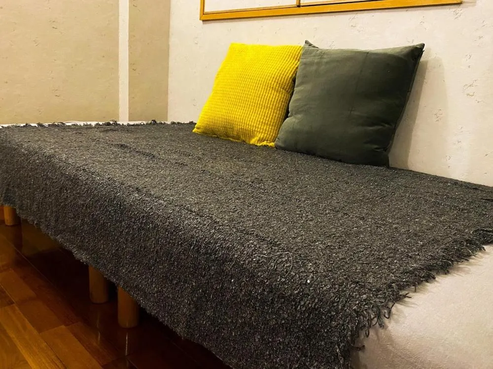 Photo of the whole room, Bed in Hotel bin