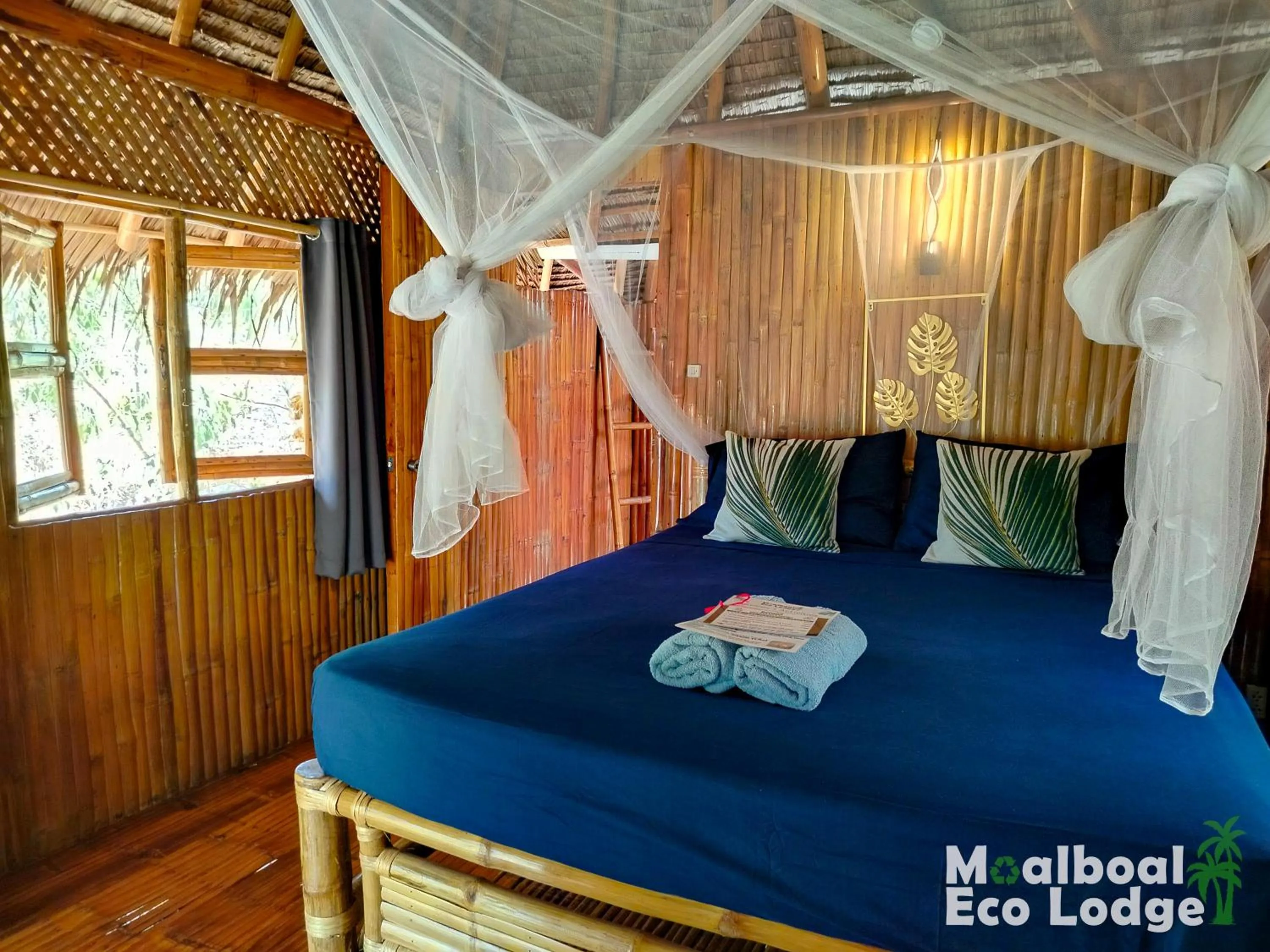 Bed in Moalboal Eco Lodge