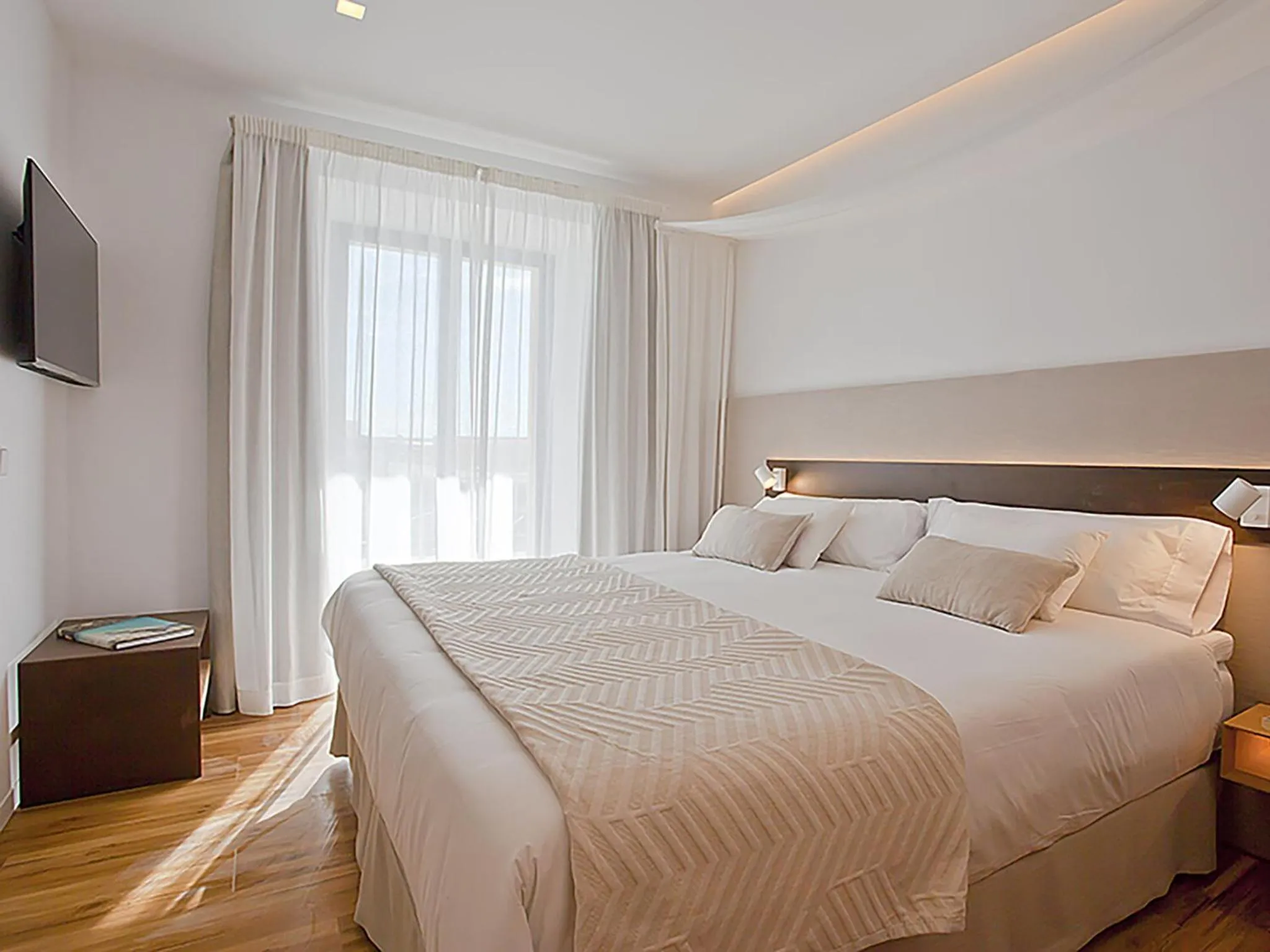 Bed in Ynaira hotel & Spa