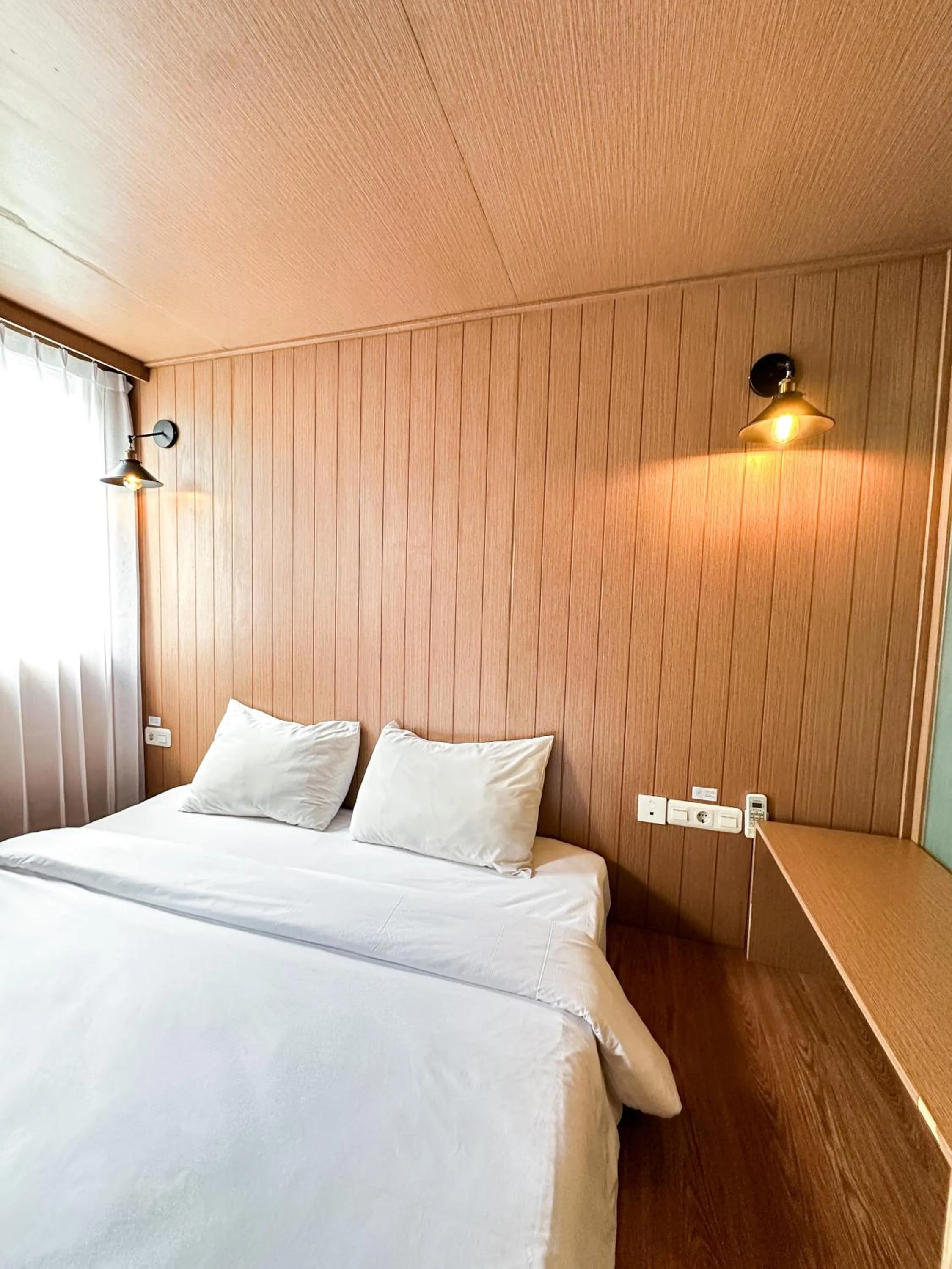 Bed in Kontena Hotel