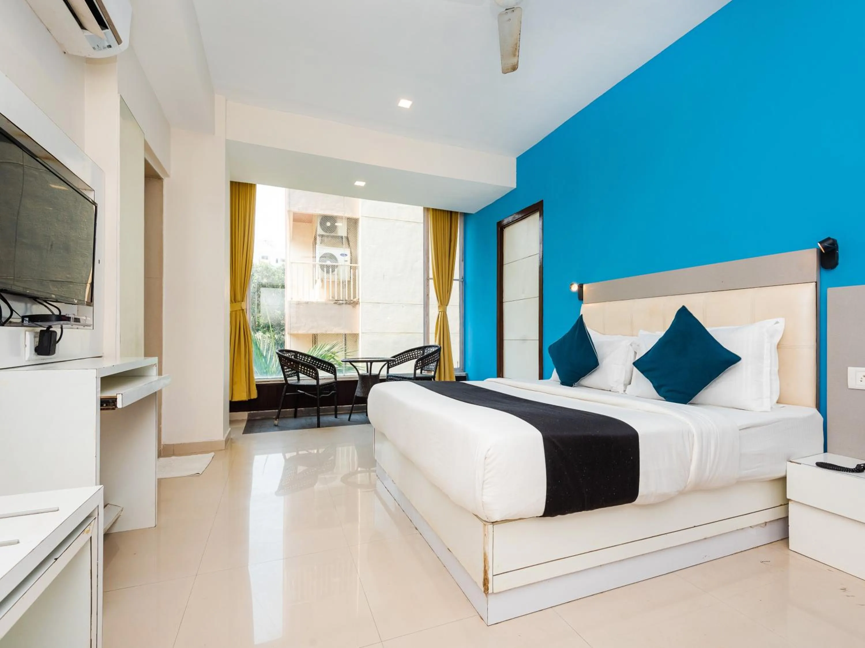 Photo of the whole room, Bed in Hotel Aura - Near Malad Link Road