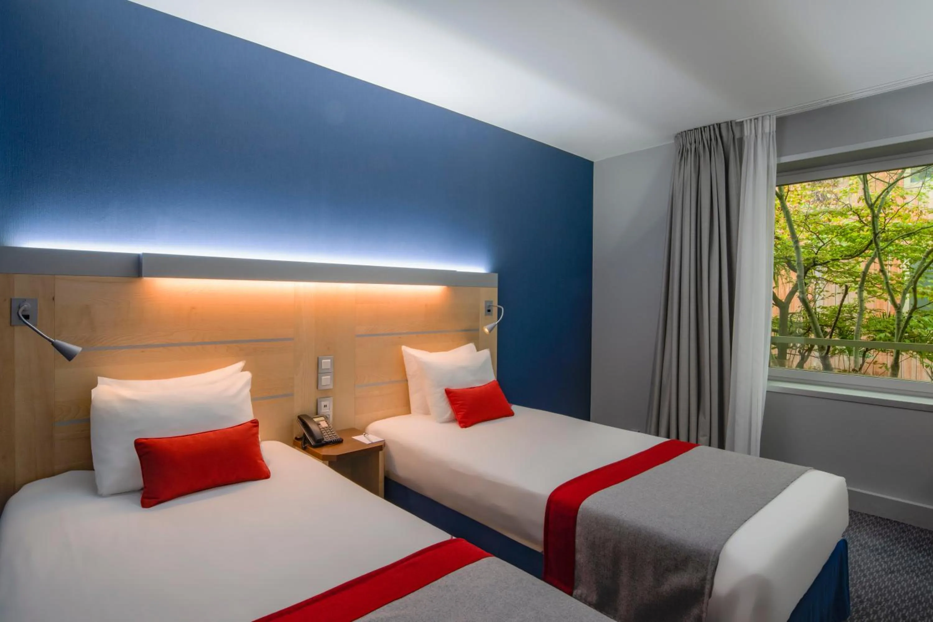 Photo of the whole room, Bed in Holiday Inn Express Paris-Canal De La Villette by IHG