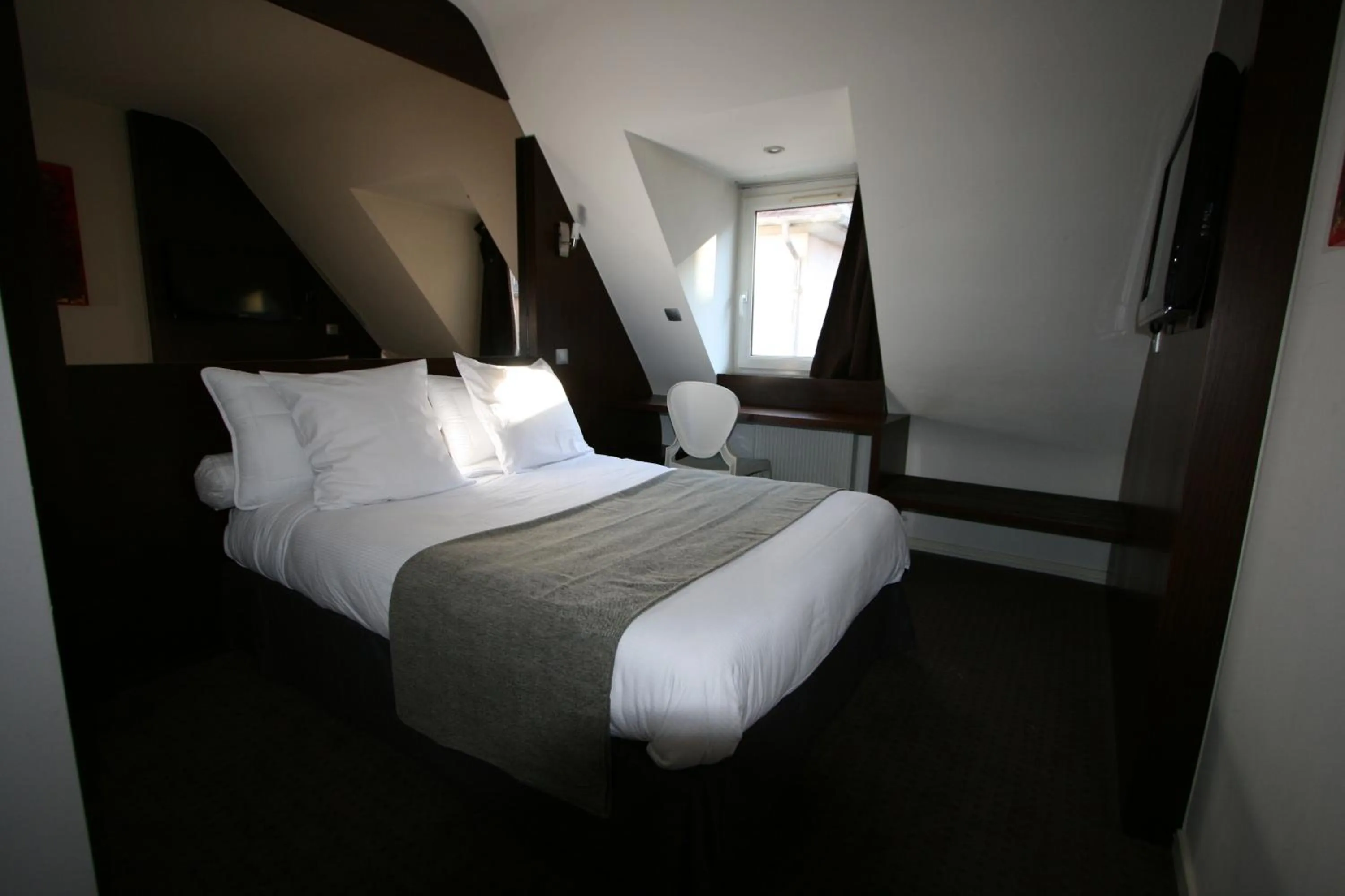 Bed in Hotel des Tonneliers