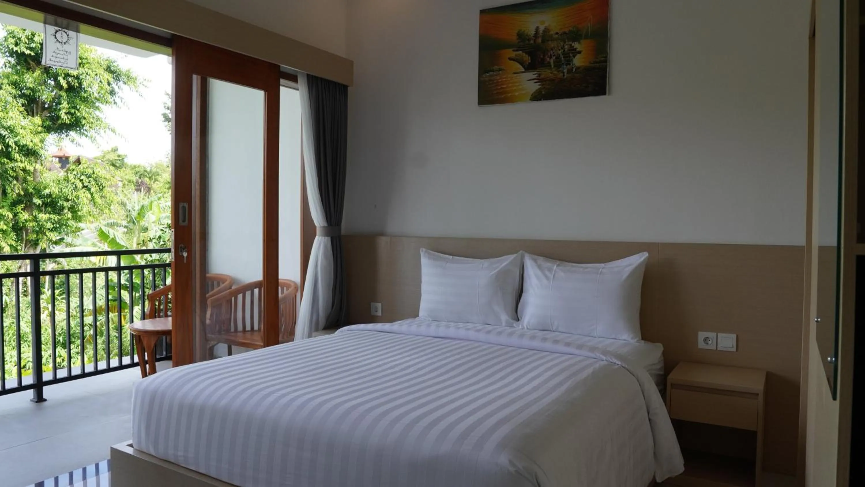 Bed in Artaloka Hotel & Restaurant