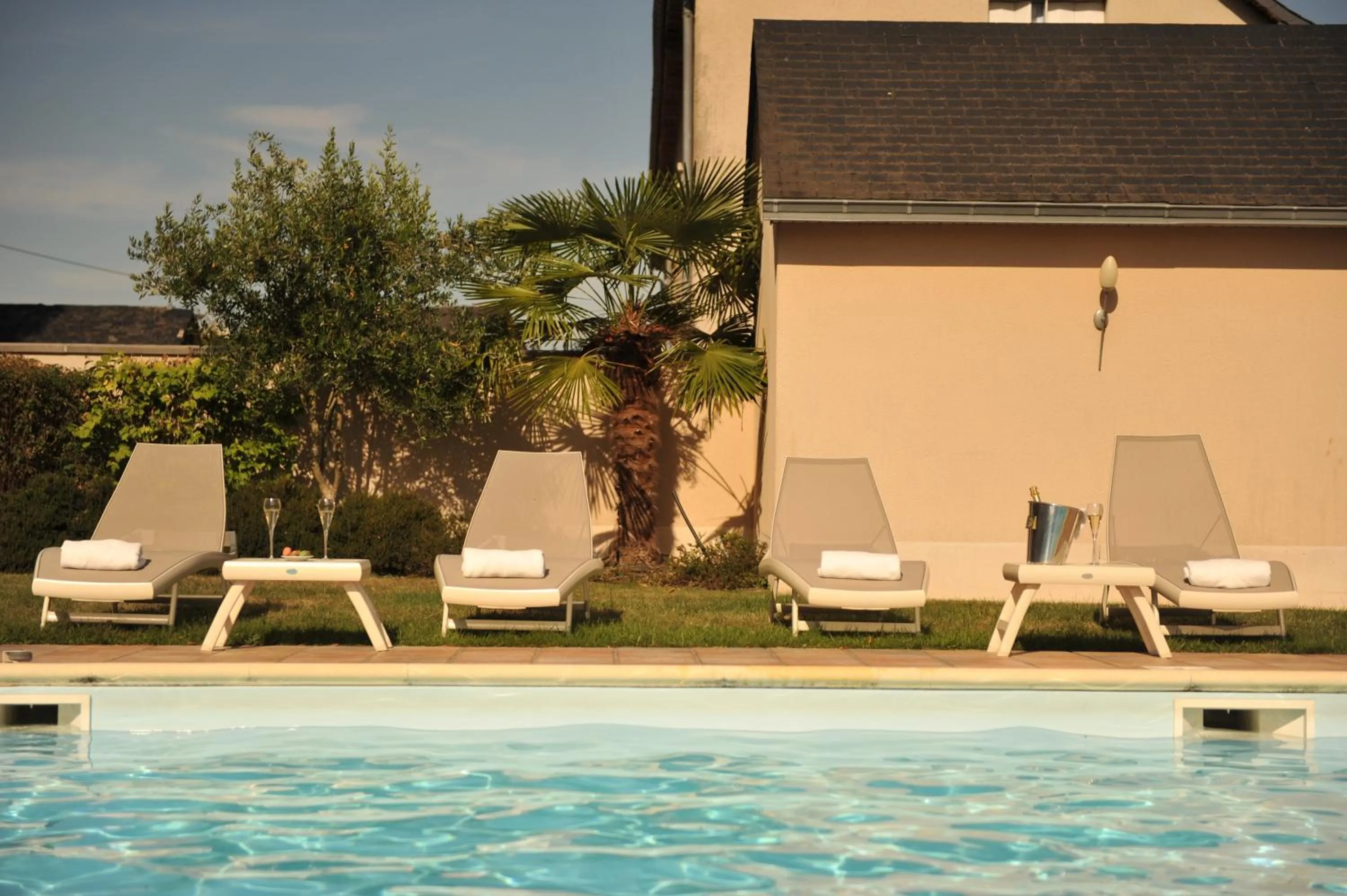 Swimming pool in Logis Le Parc Hotel & Spa