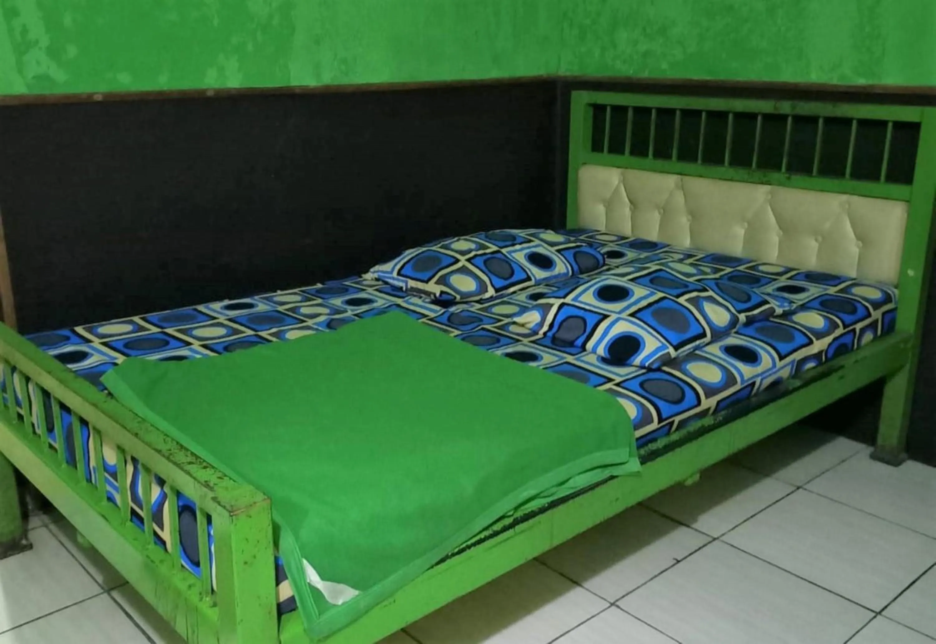 Bed in Penginapan 99