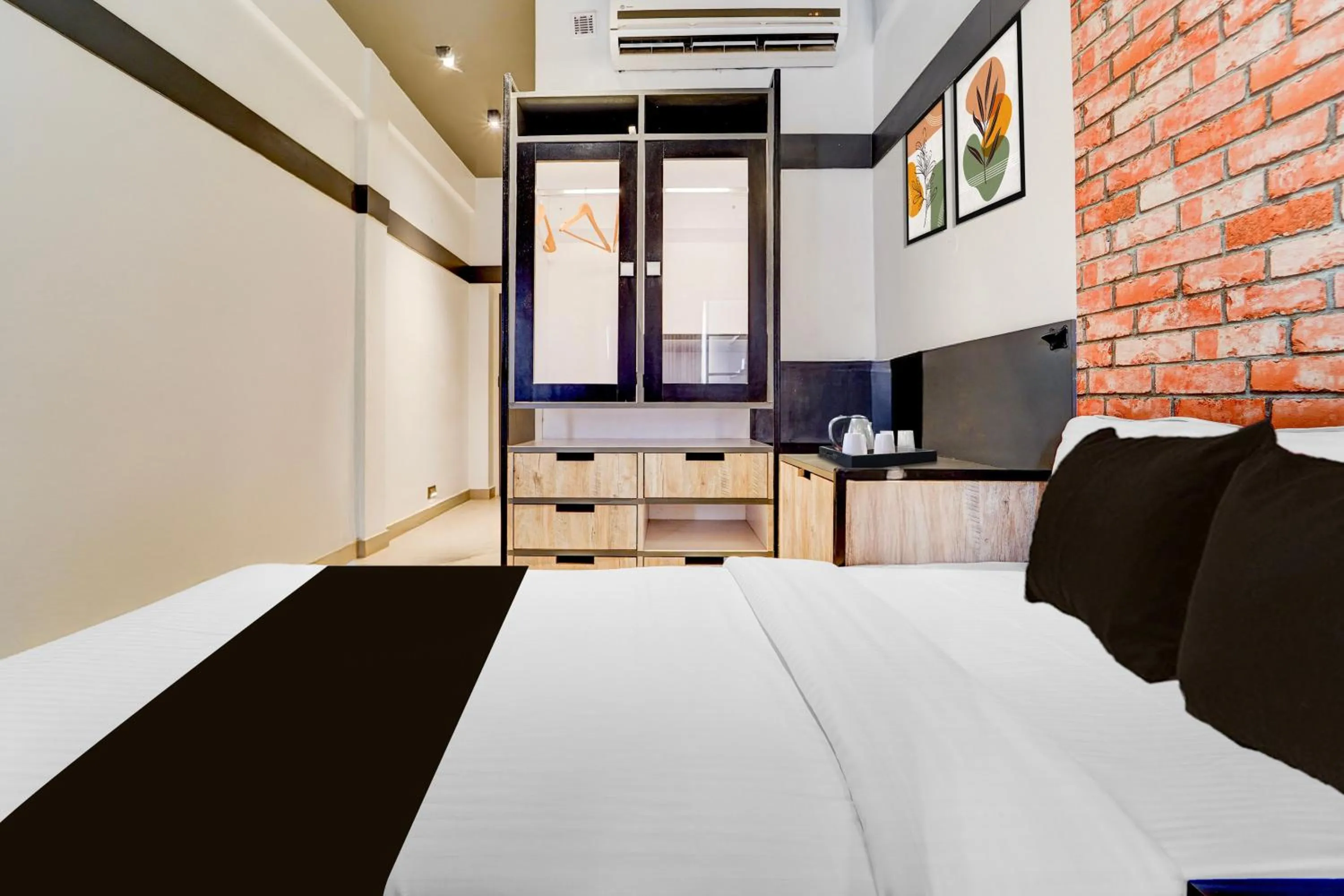 Bedroom, Bed in Super Townhouse Oak Mangalore