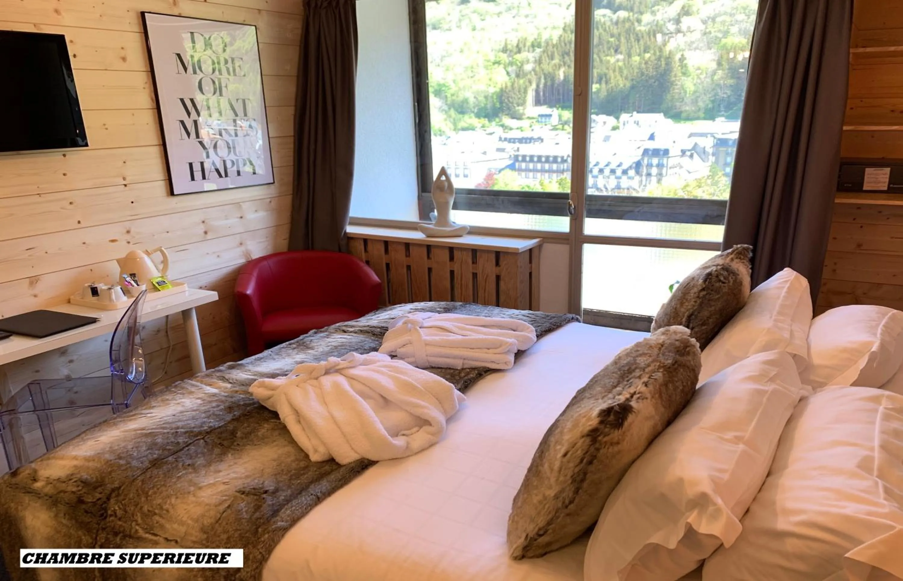 Photo of the whole room, Bed in The Originals Boutique Hotel Le Panorama Mont Dore