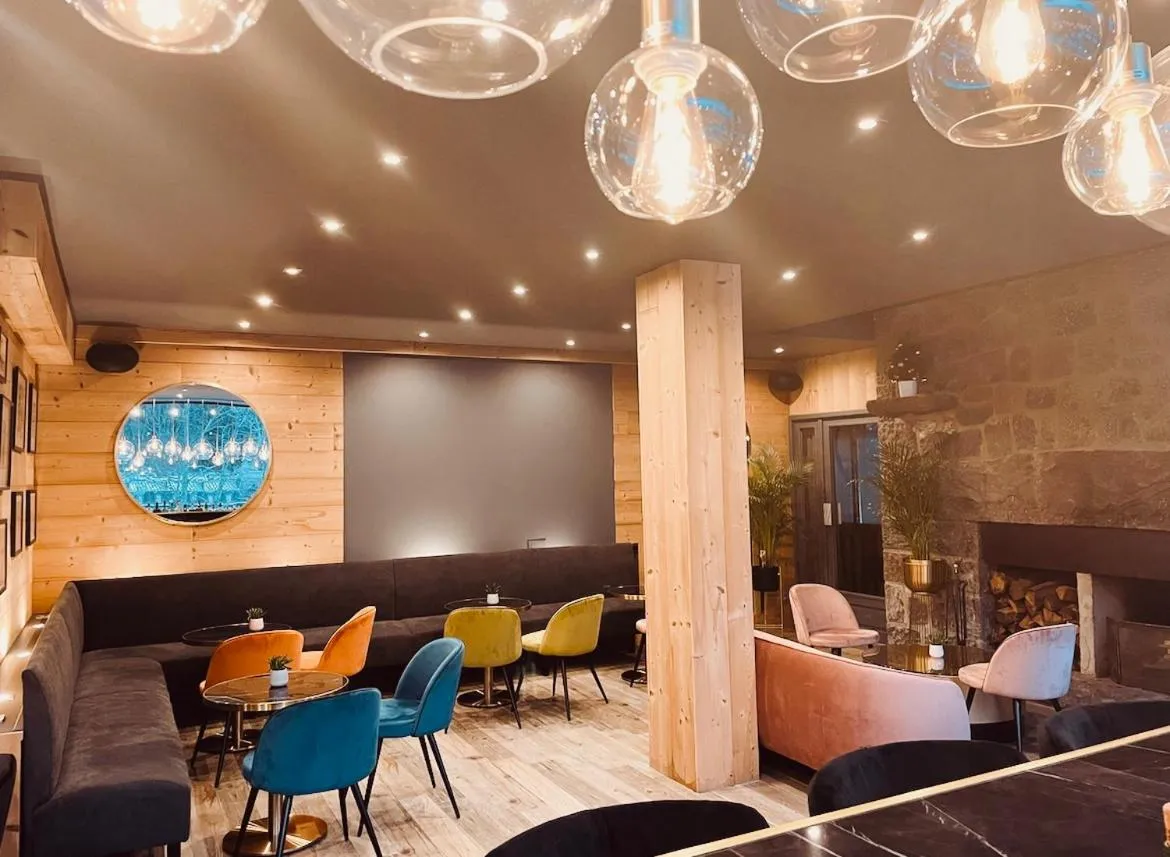 Lounge or bar in The Originals Boutique Hotel Le Panorama Mont Dore