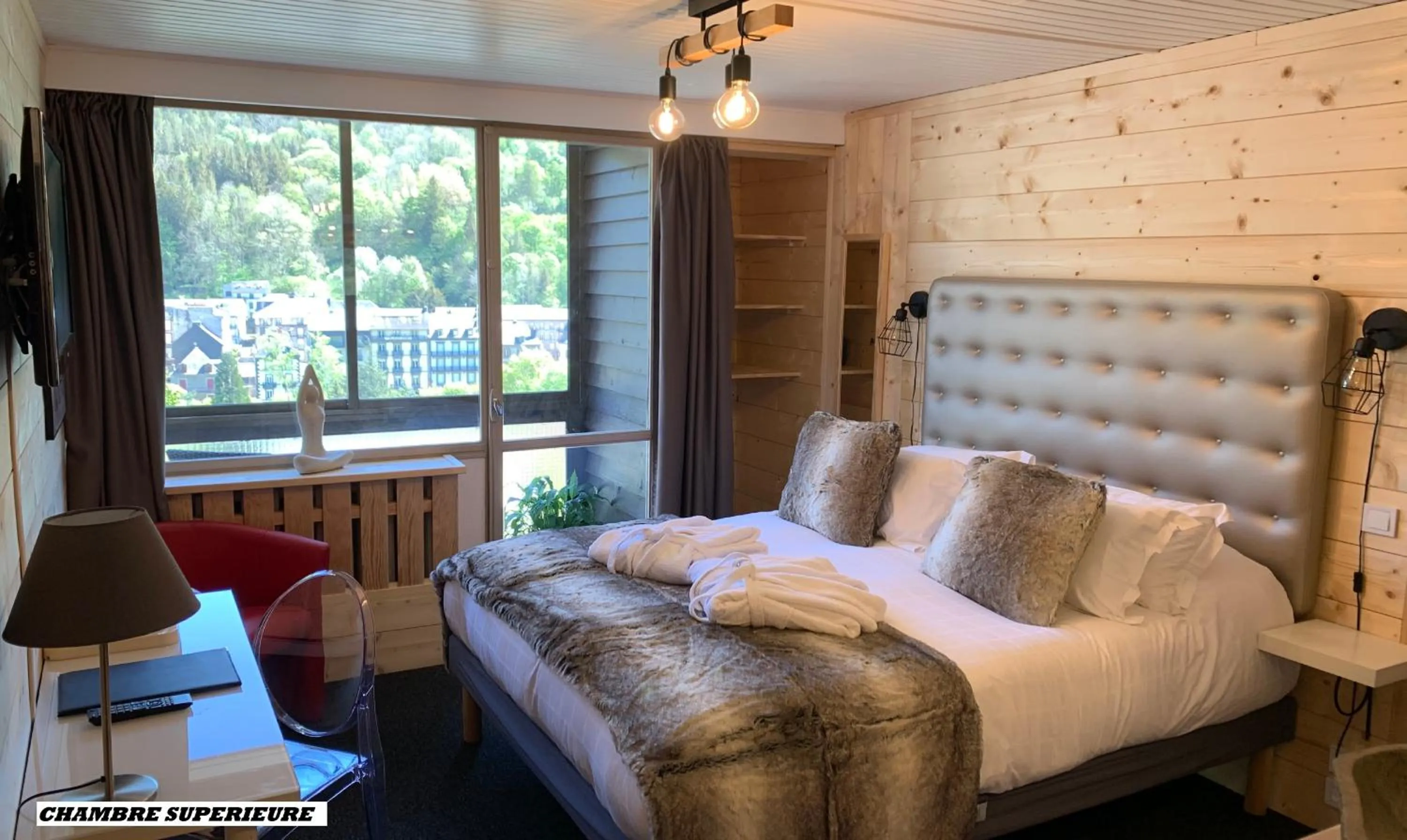 Photo of the whole room, Bed in The Originals Boutique Hotel Le Panorama Mont Dore