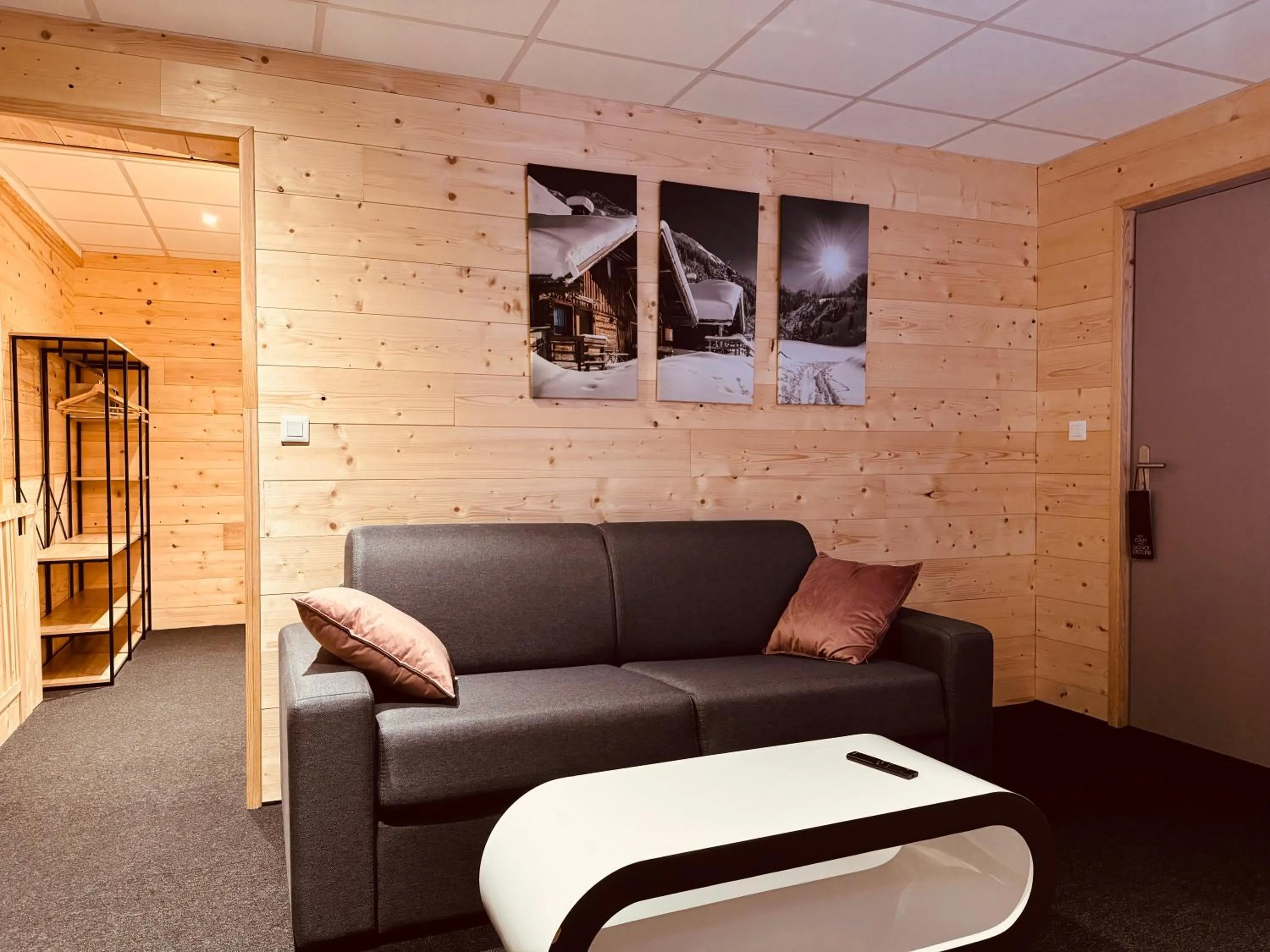 Living room in The Originals Boutique Hotel Le Panorama Mont Dore