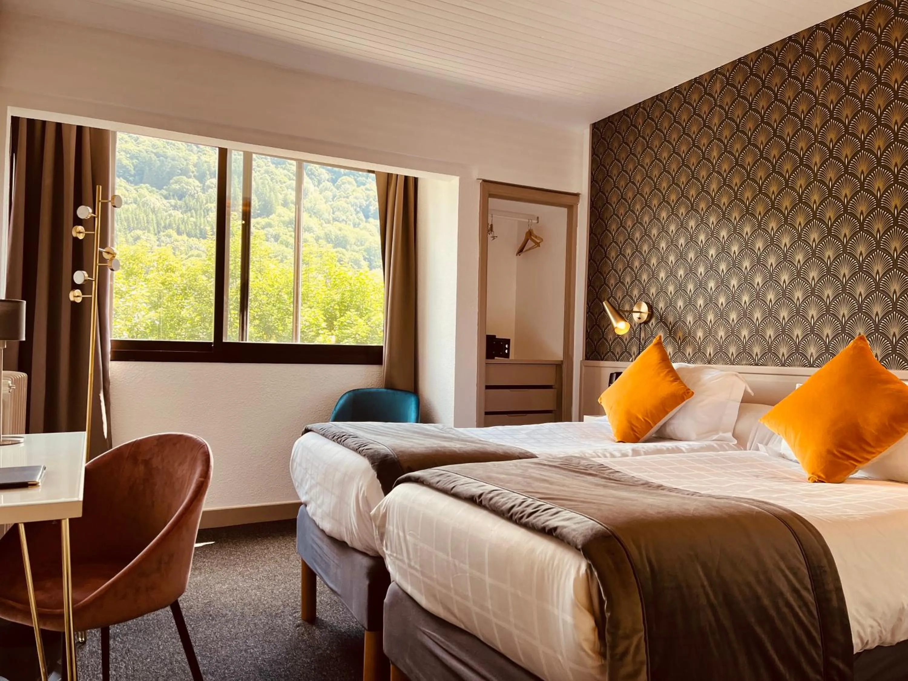 Bed in The Originals Boutique Hotel Le Panorama Mont Dore