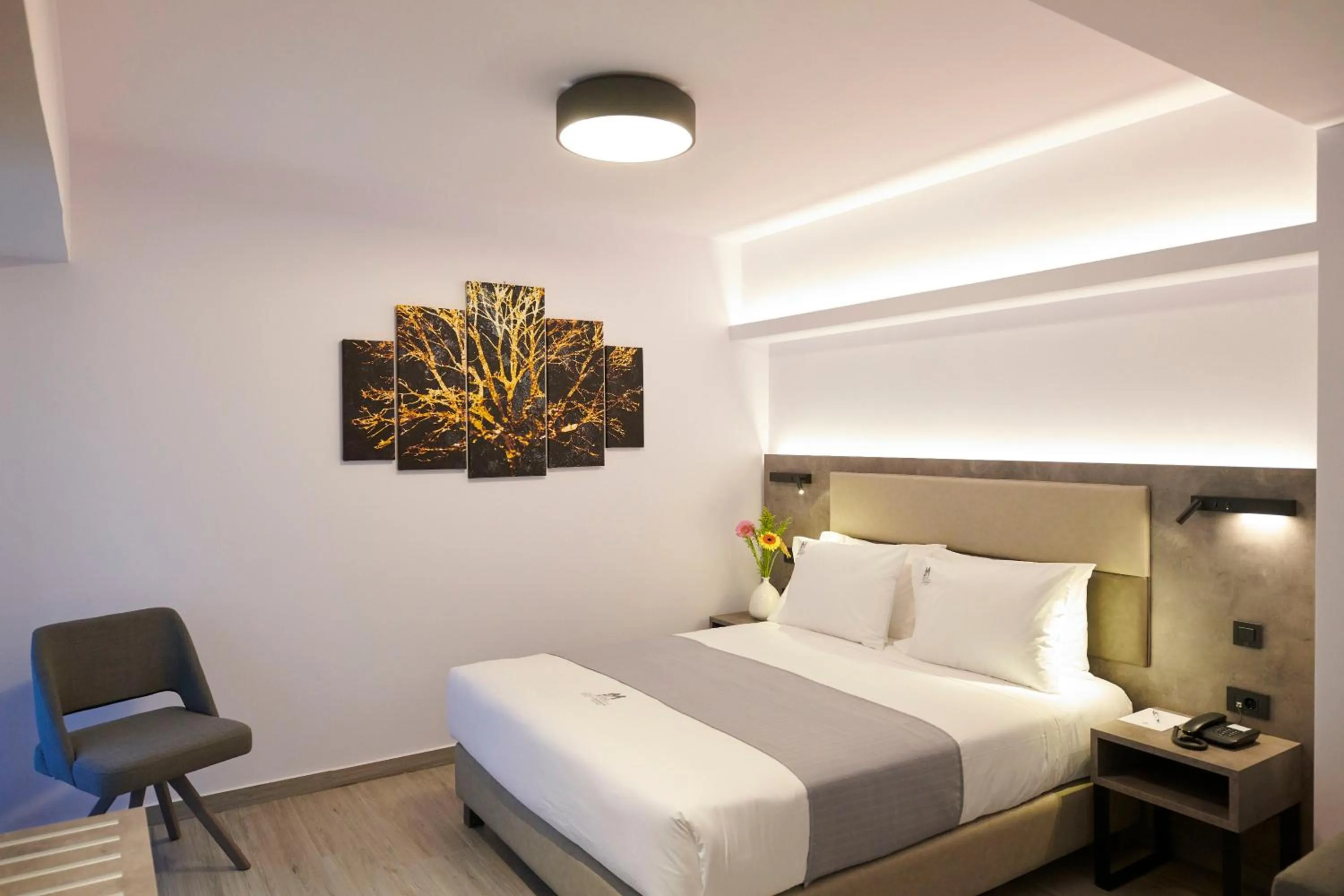 Bed in Meni Hotel & Apartments UNDER NEW MANAGEMENT