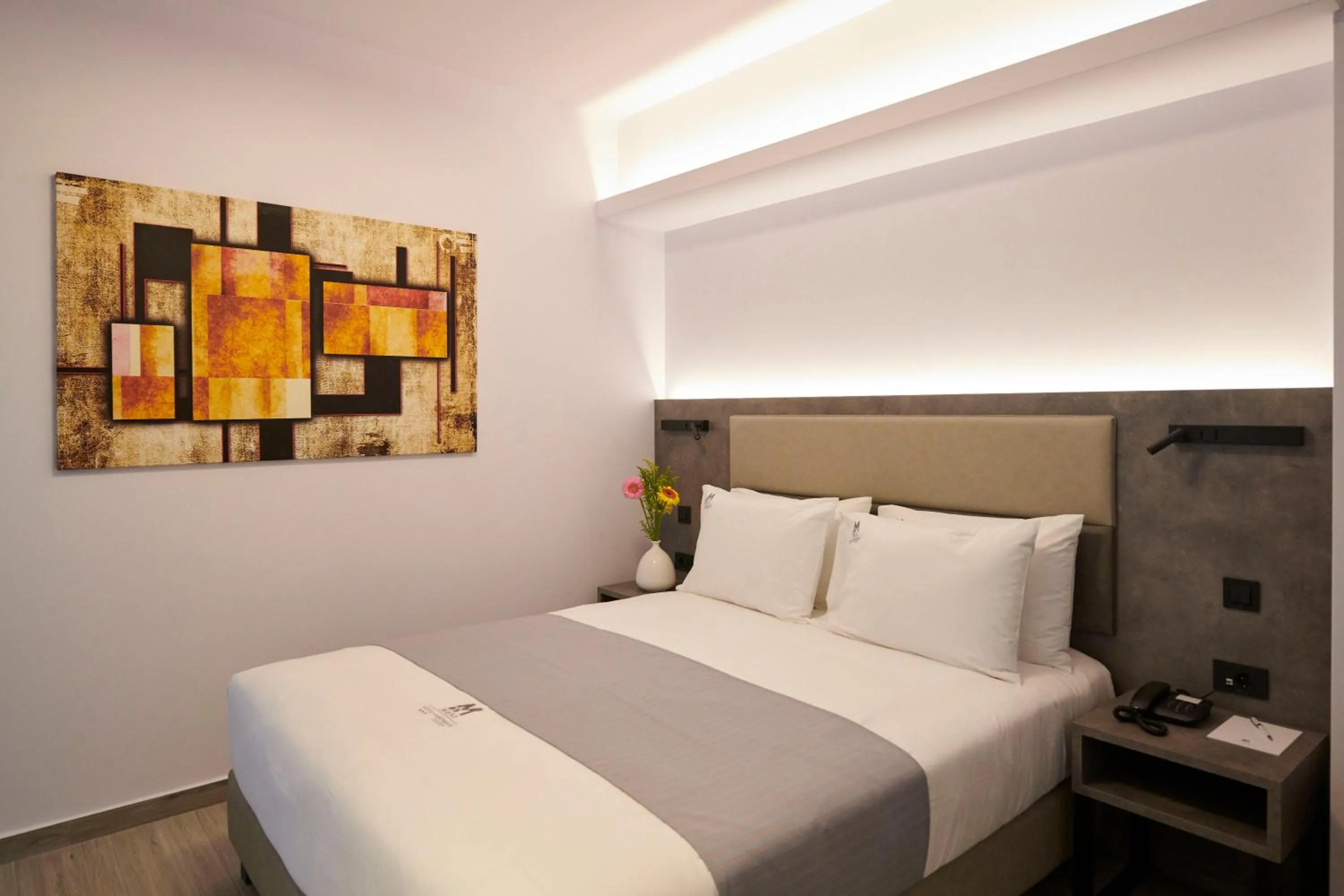 Bed in Meni Hotel & Apartments UNDER NEW MANAGEMENT
