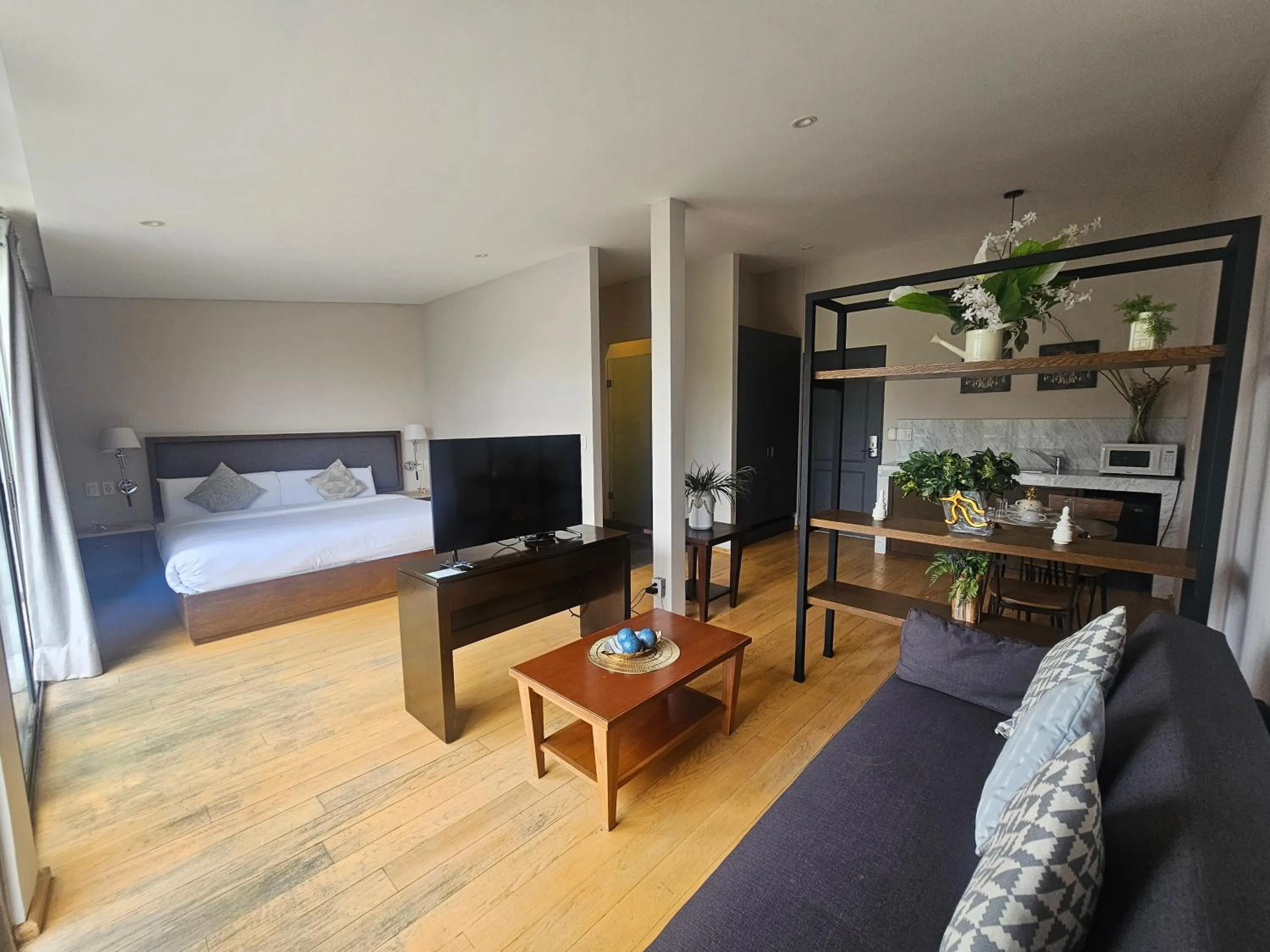 Communal lounge/ TV room, Bed in Close To You By Residence L´Heritage BlueBay