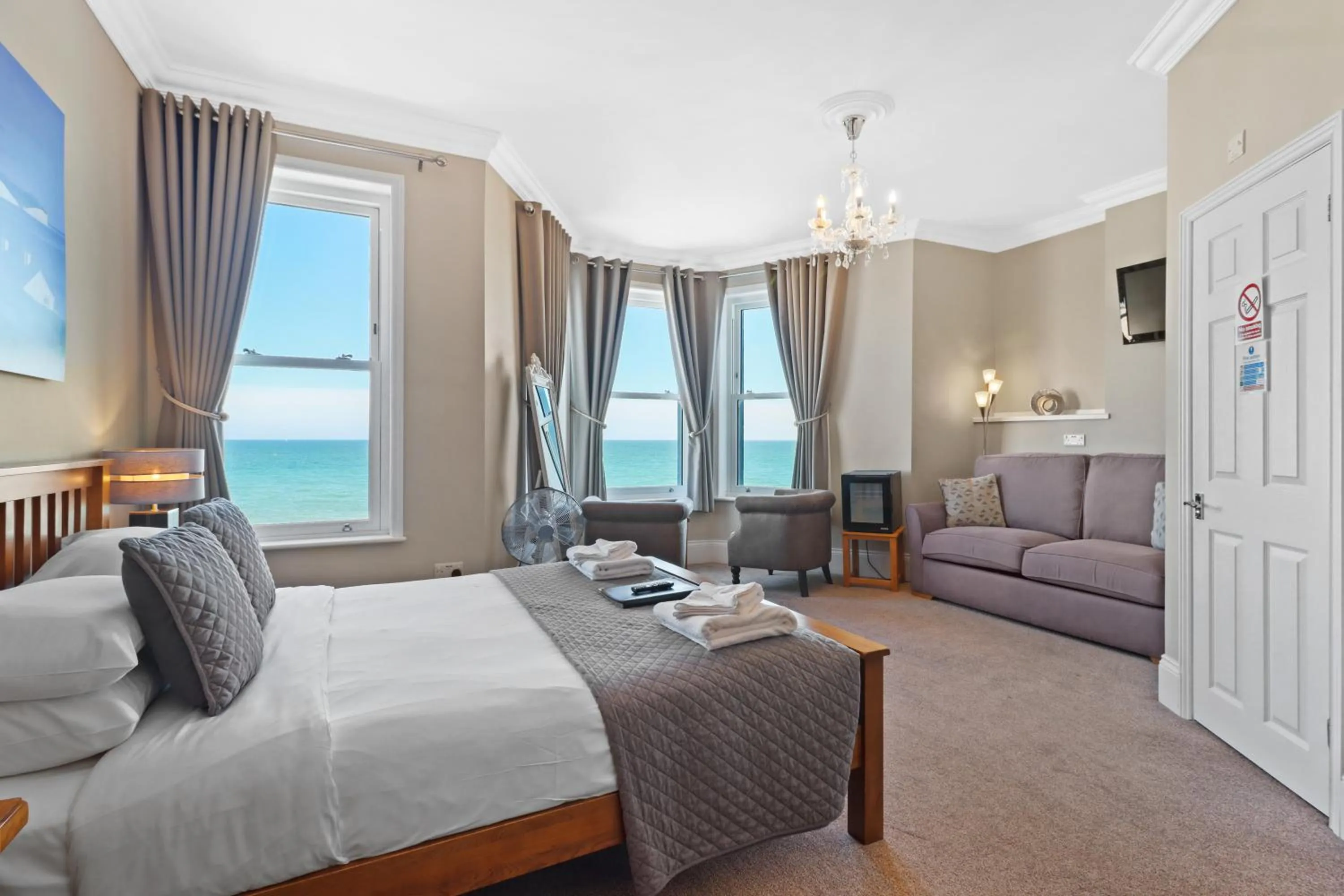 Seating area, Bed in Beach Front Guest House