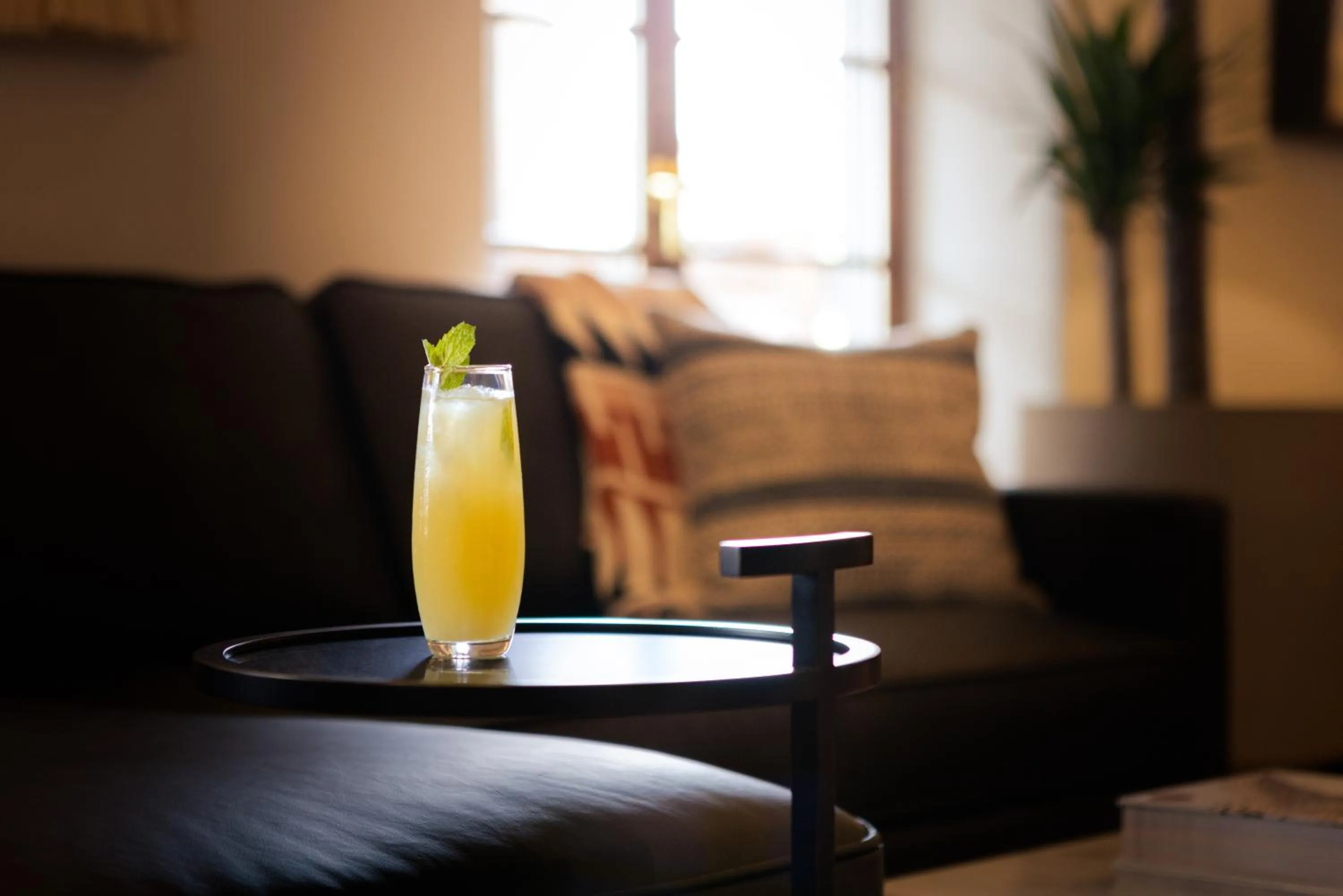 Drinks in Piñon Court by La Fonda