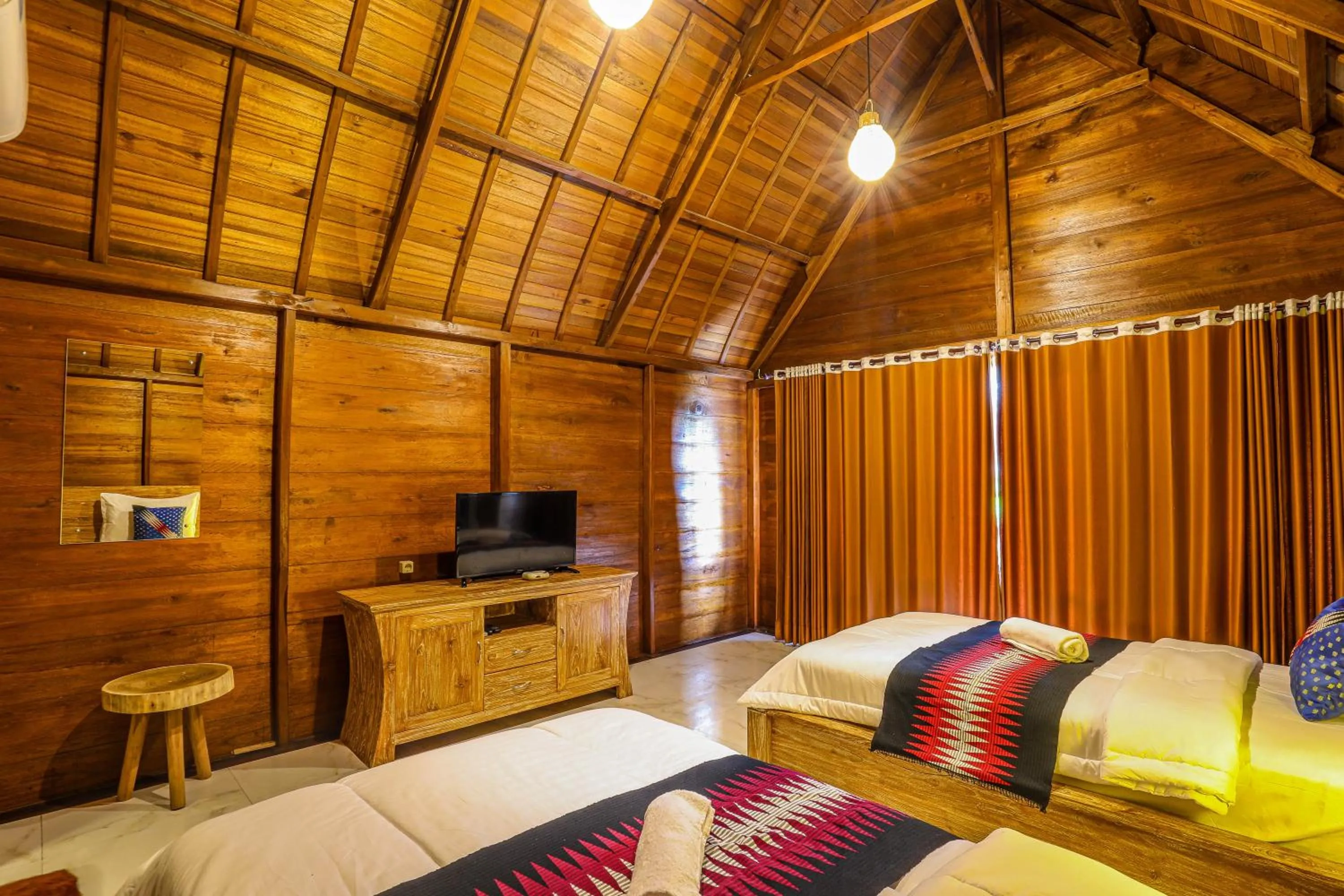 Bed in The Tukad Gepuh Cottage and Resto