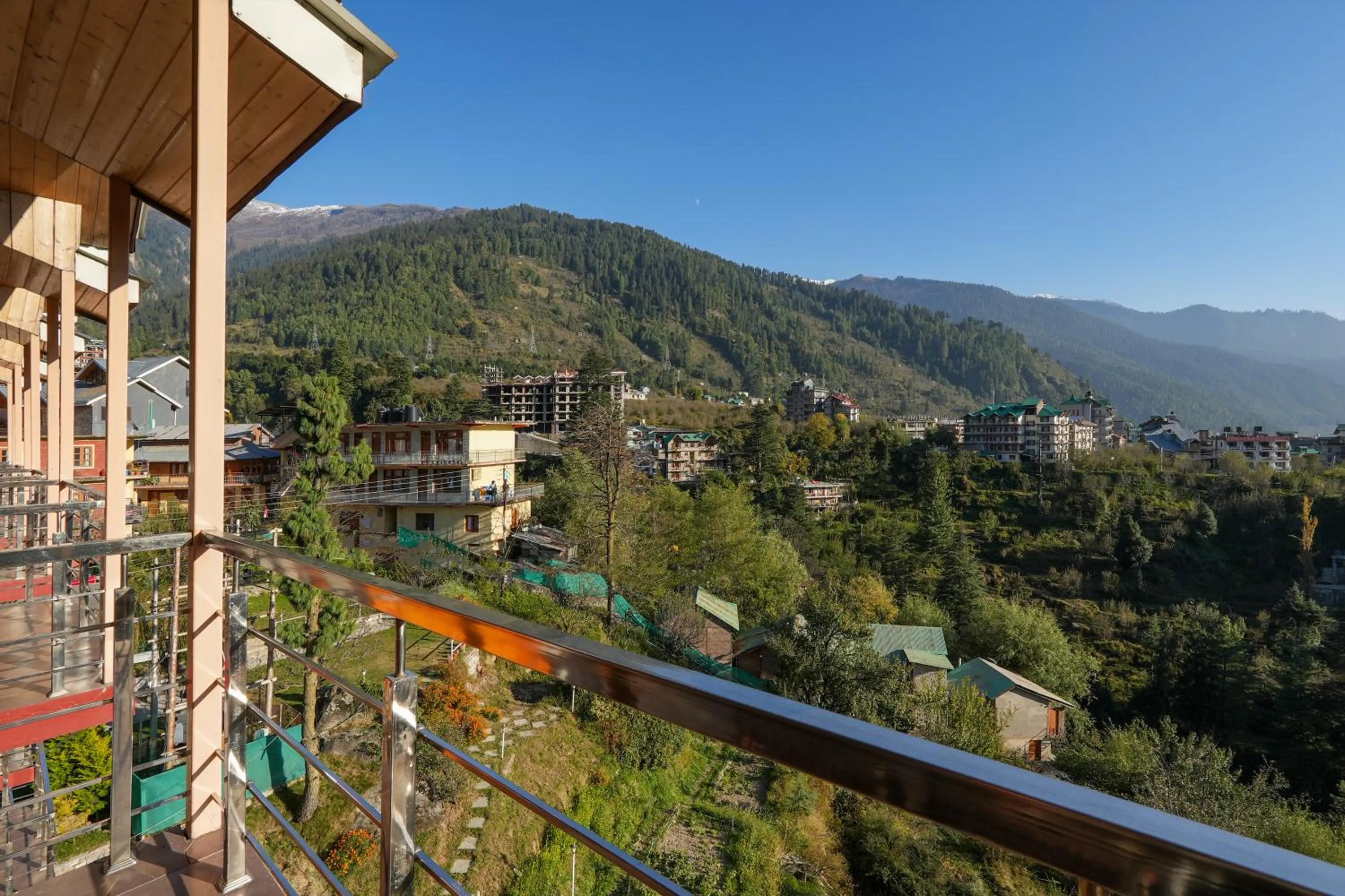 Day in Snow City's Montana Blues Resort Manali - Heated & Air-Cooled Stay