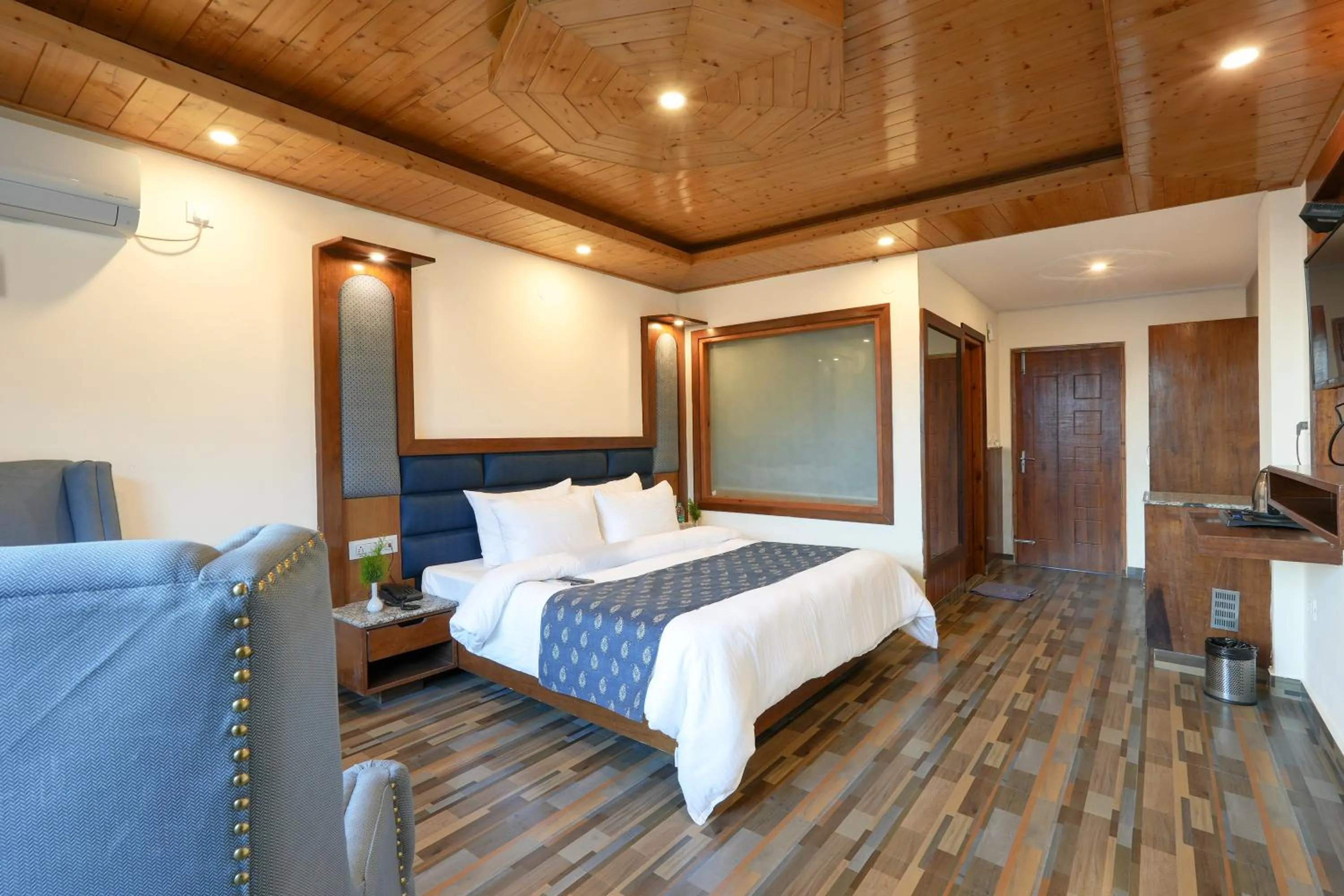 Bed in Snow City's Montana Blues Resort Manali - Heated & Air-Cooled Stay