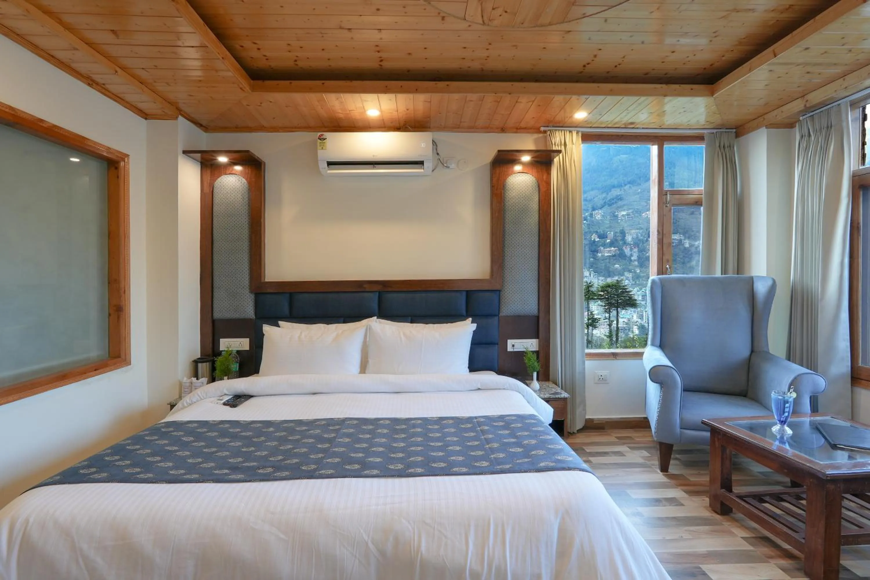 Bed in Snow City's Montana Blues Resort Manali - Heated & Air-Cooled Stay