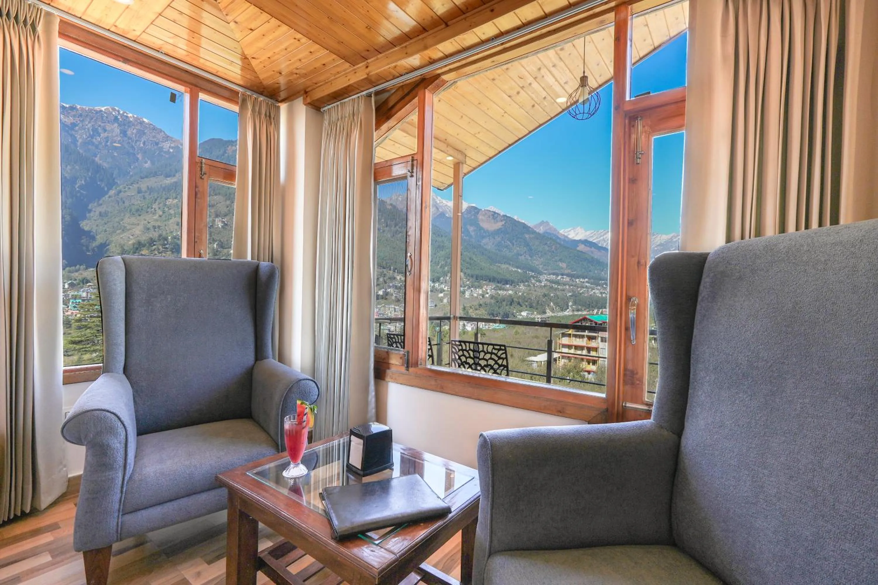 Day in Snow City's Montana Blues Resort Manali - Heated & Air-Cooled Stay