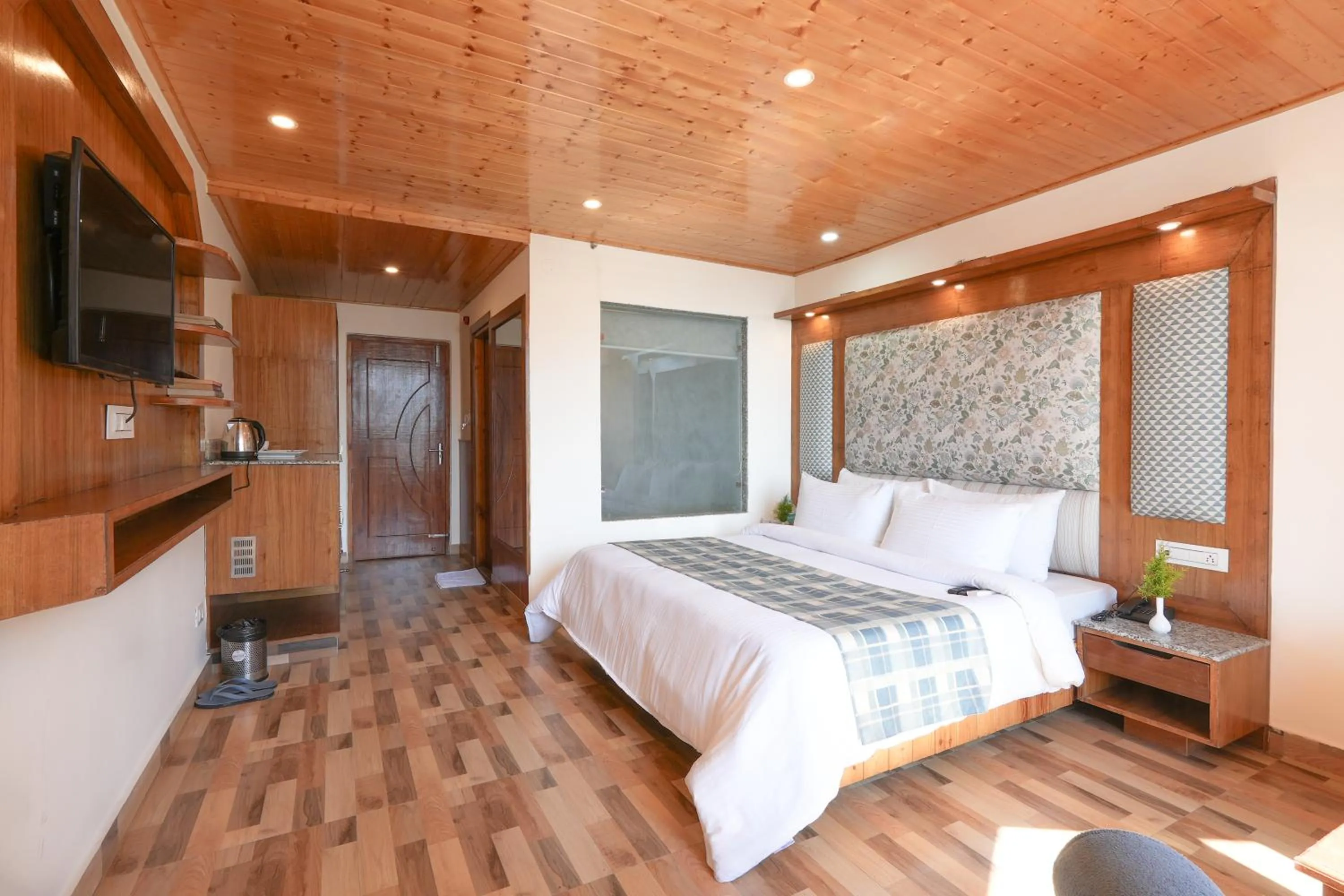 Bed in Snow City's Montana Blues Resort Manali - Heated & Air-Cooled Stay