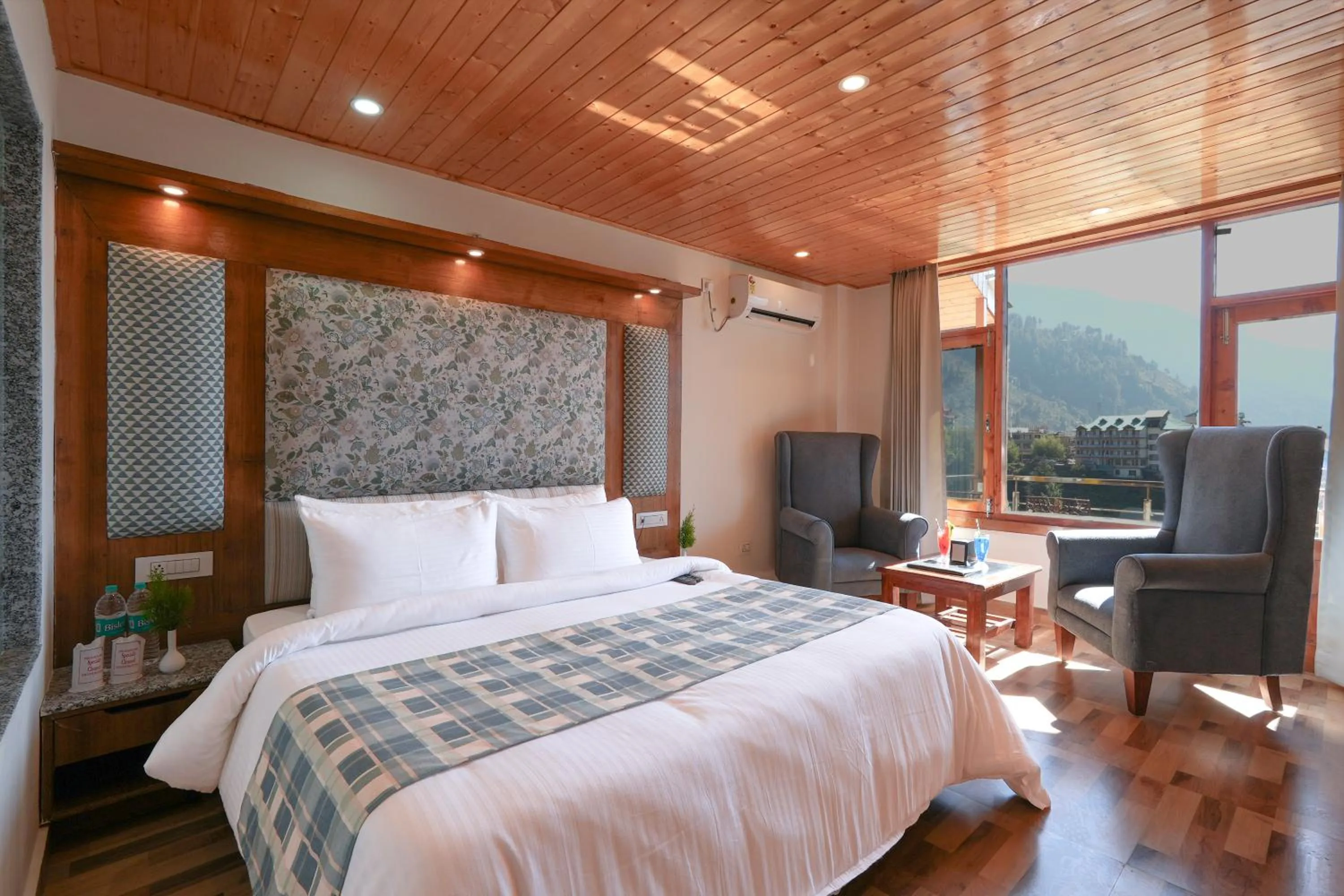 Bed in Snow City's Montana Blues Resort Manali - Heated & Air-Cooled Stay