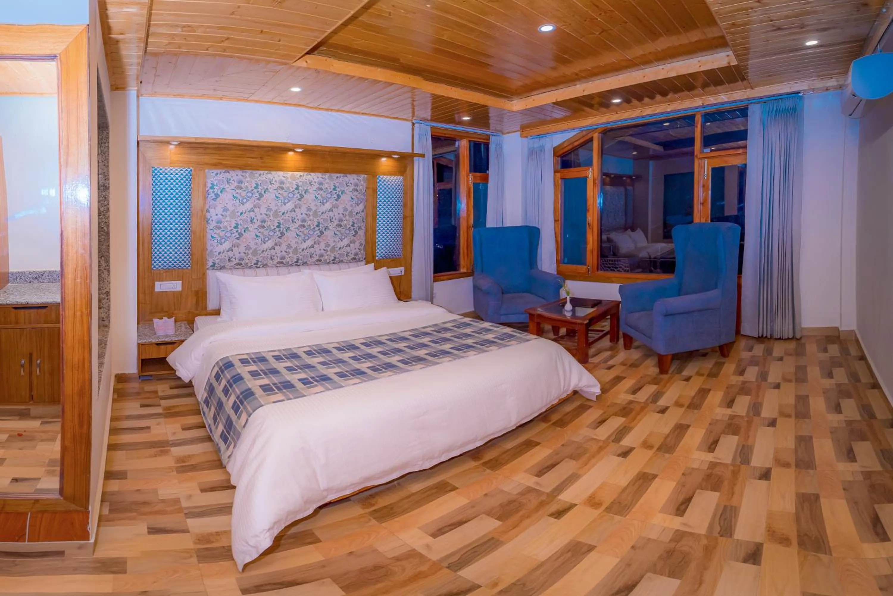 Bed in Snow City's Montana Blues Resort Manali - Heated & Air-Cooled Stay