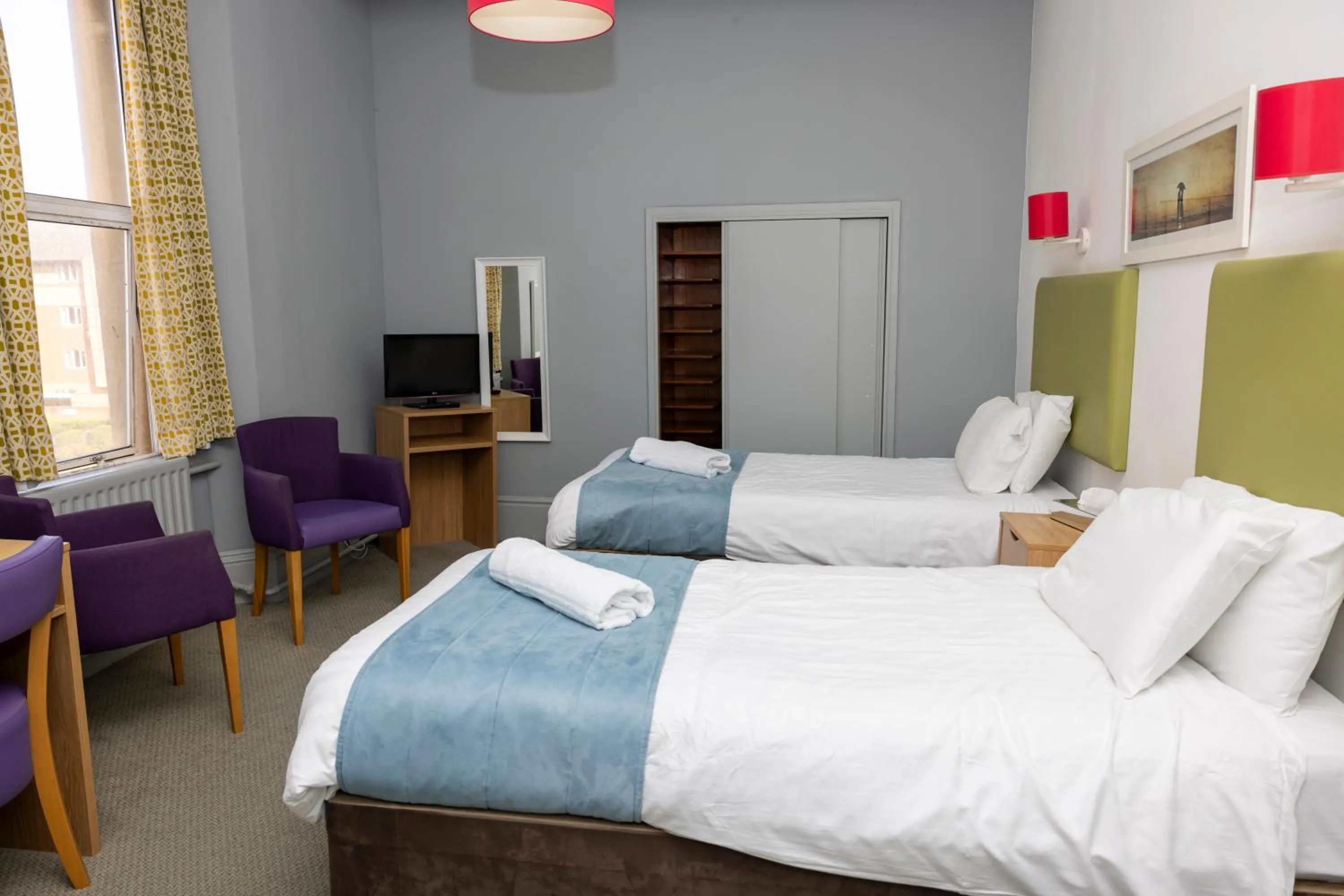 Bed in The Grand Atlantic Hotel