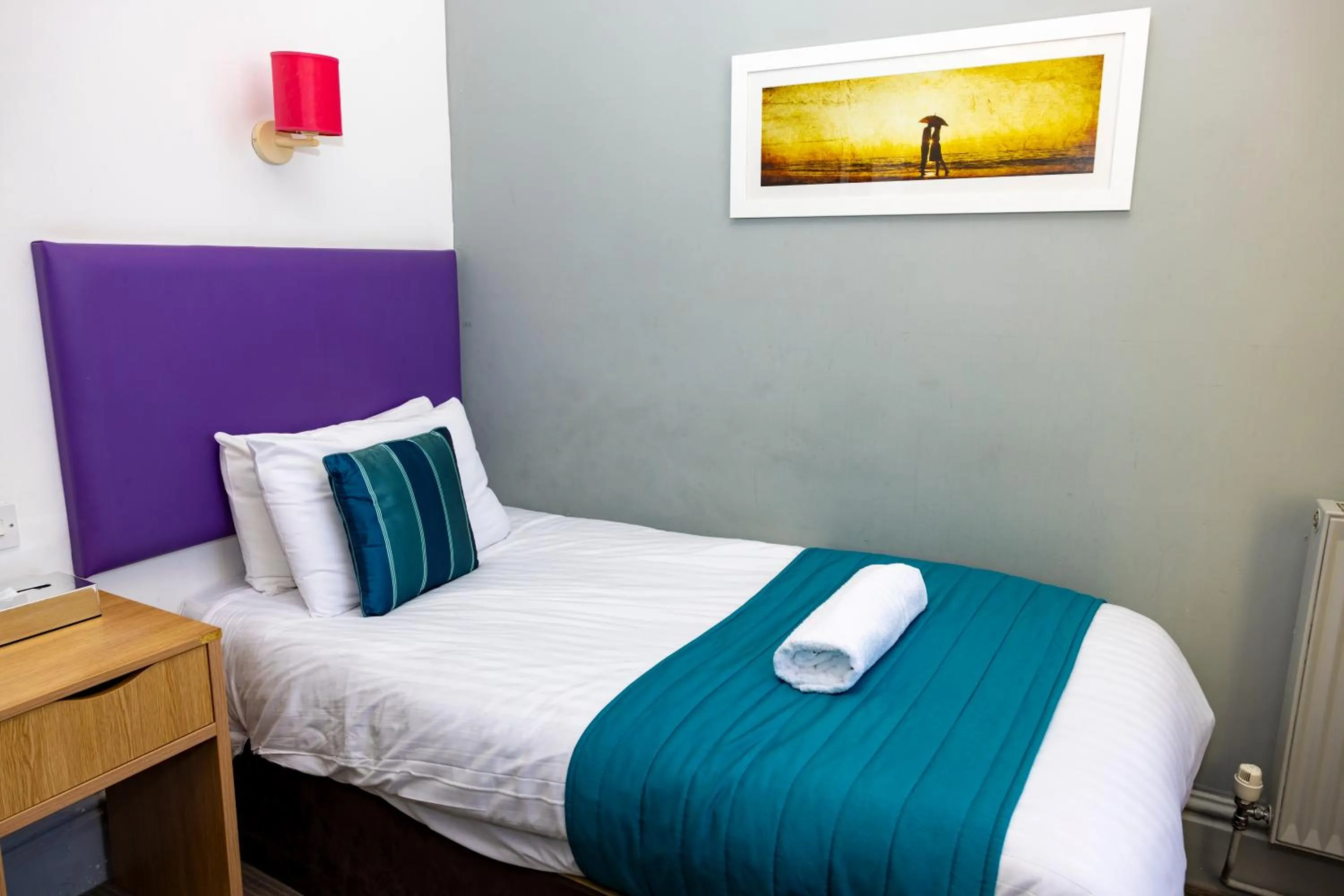 Bed in The Grand Atlantic Hotel