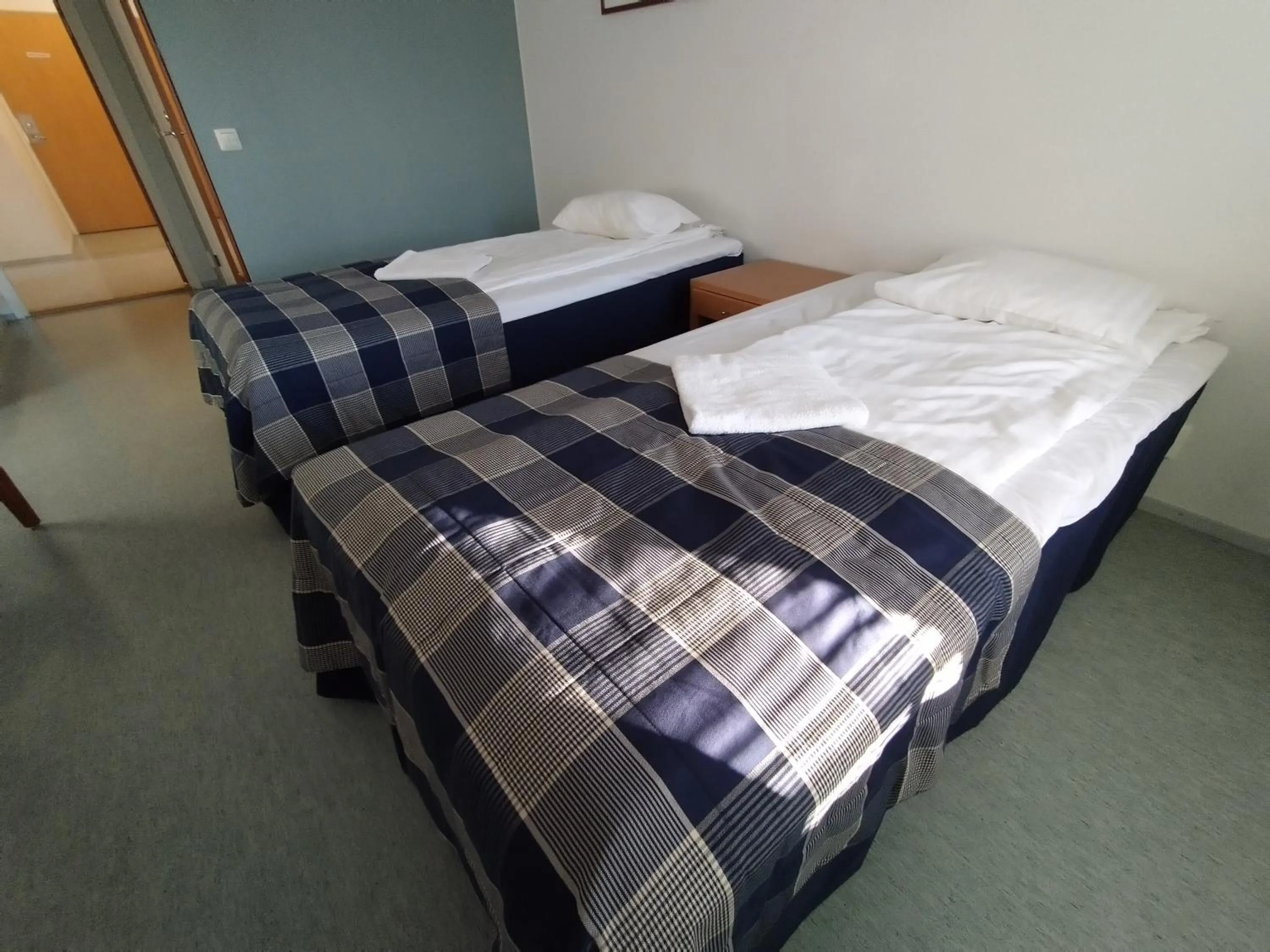 Bed in West Side Hotel