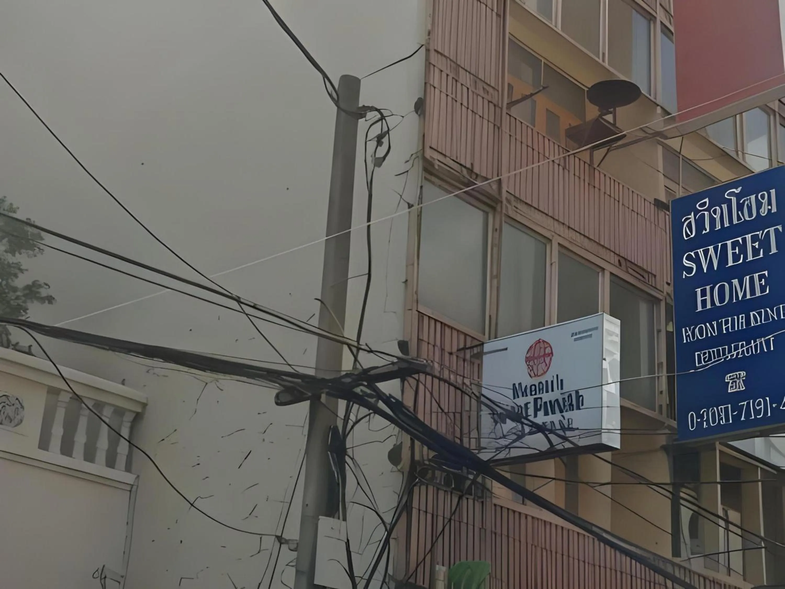 Property building in OYO 583 Sweethome Guest House