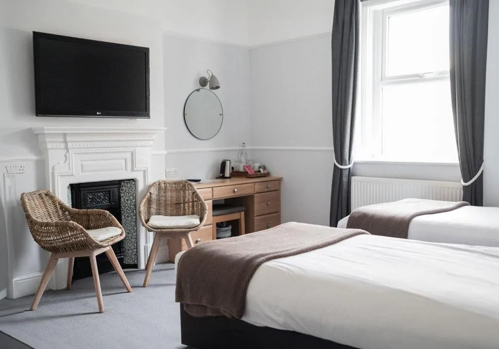 Bed in The Kingswood Hotel