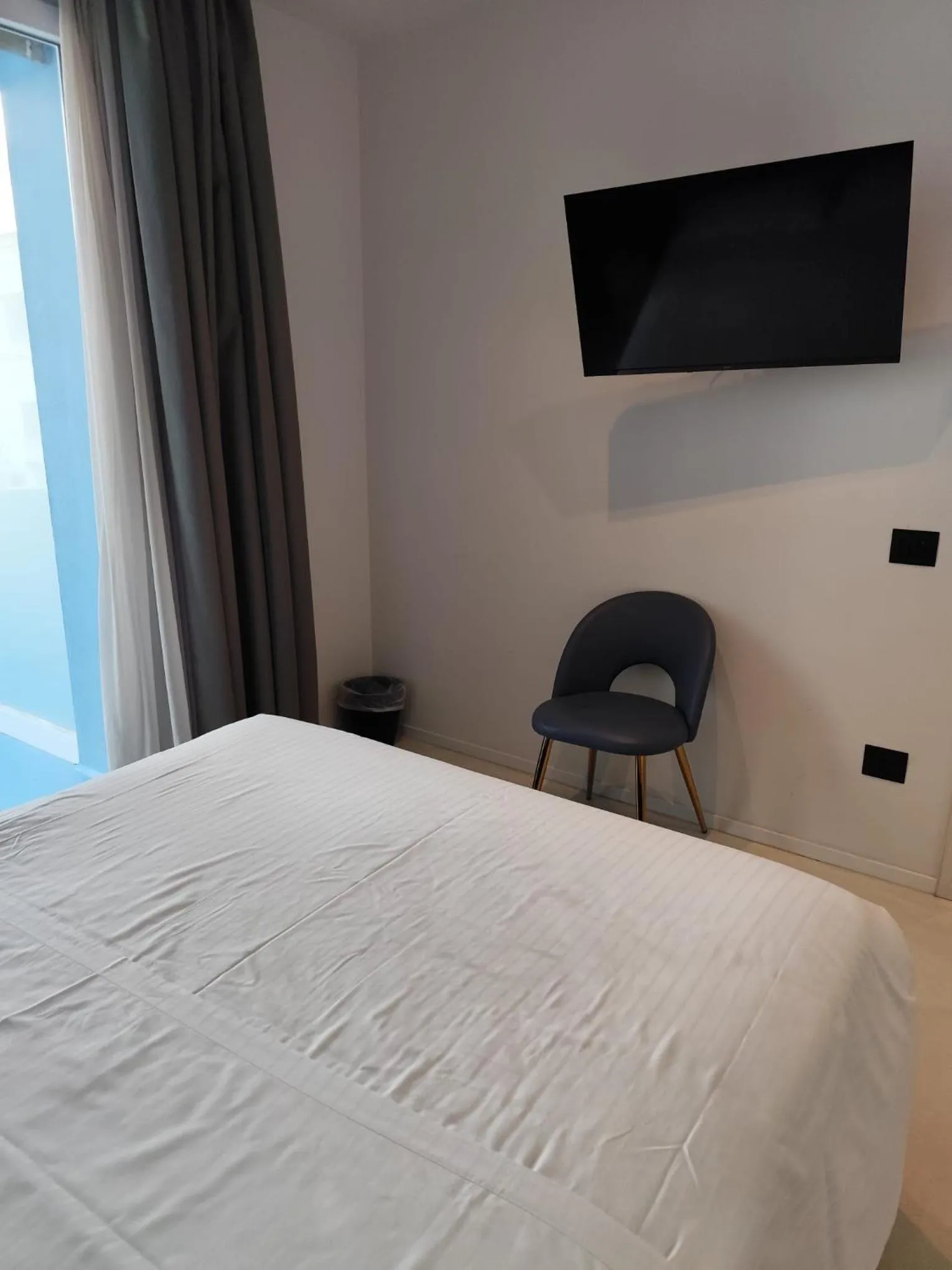 Bed in Gabbiano Suites