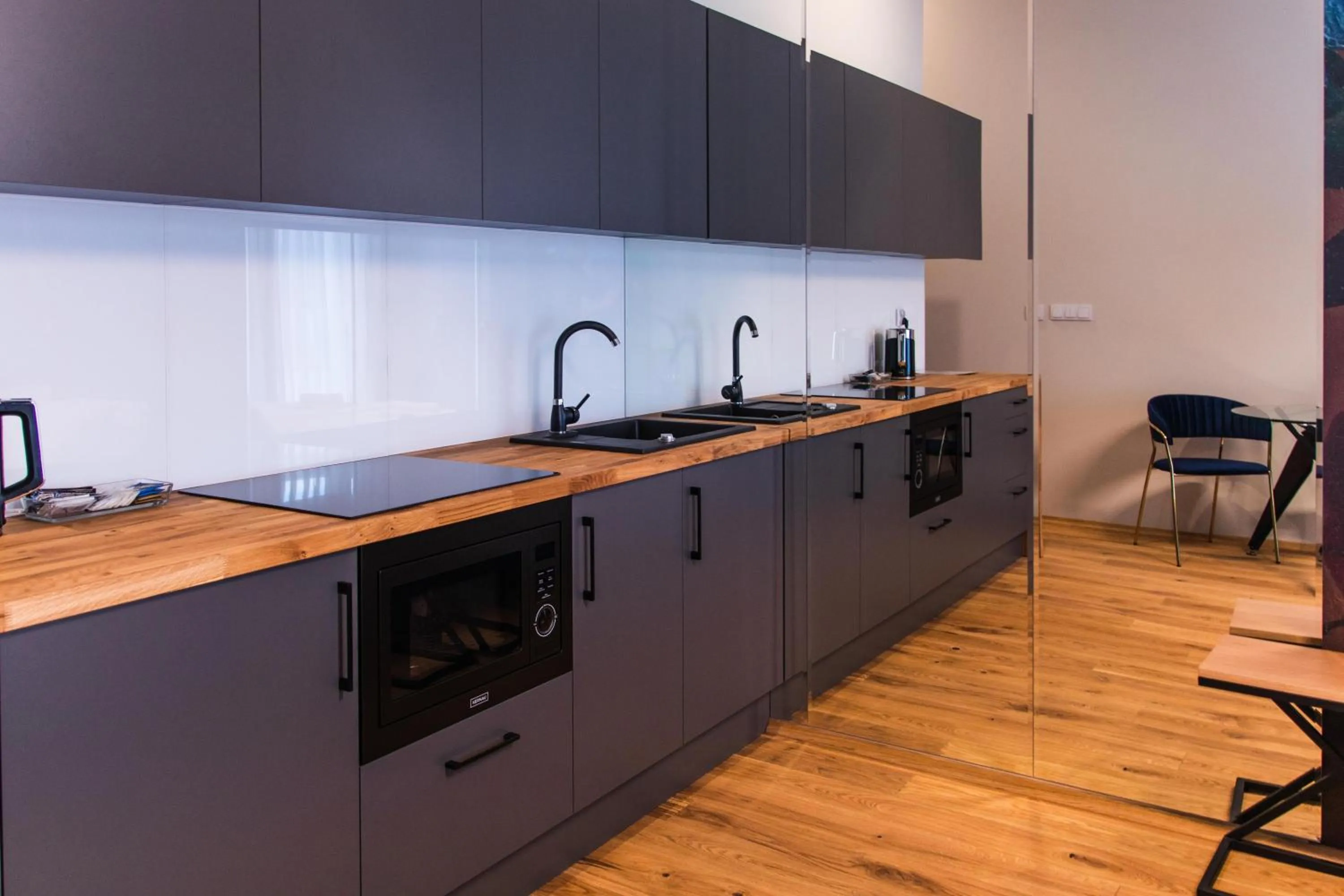 Kitchen or kitchenette in Aparthotel Inspire Miodova Residence