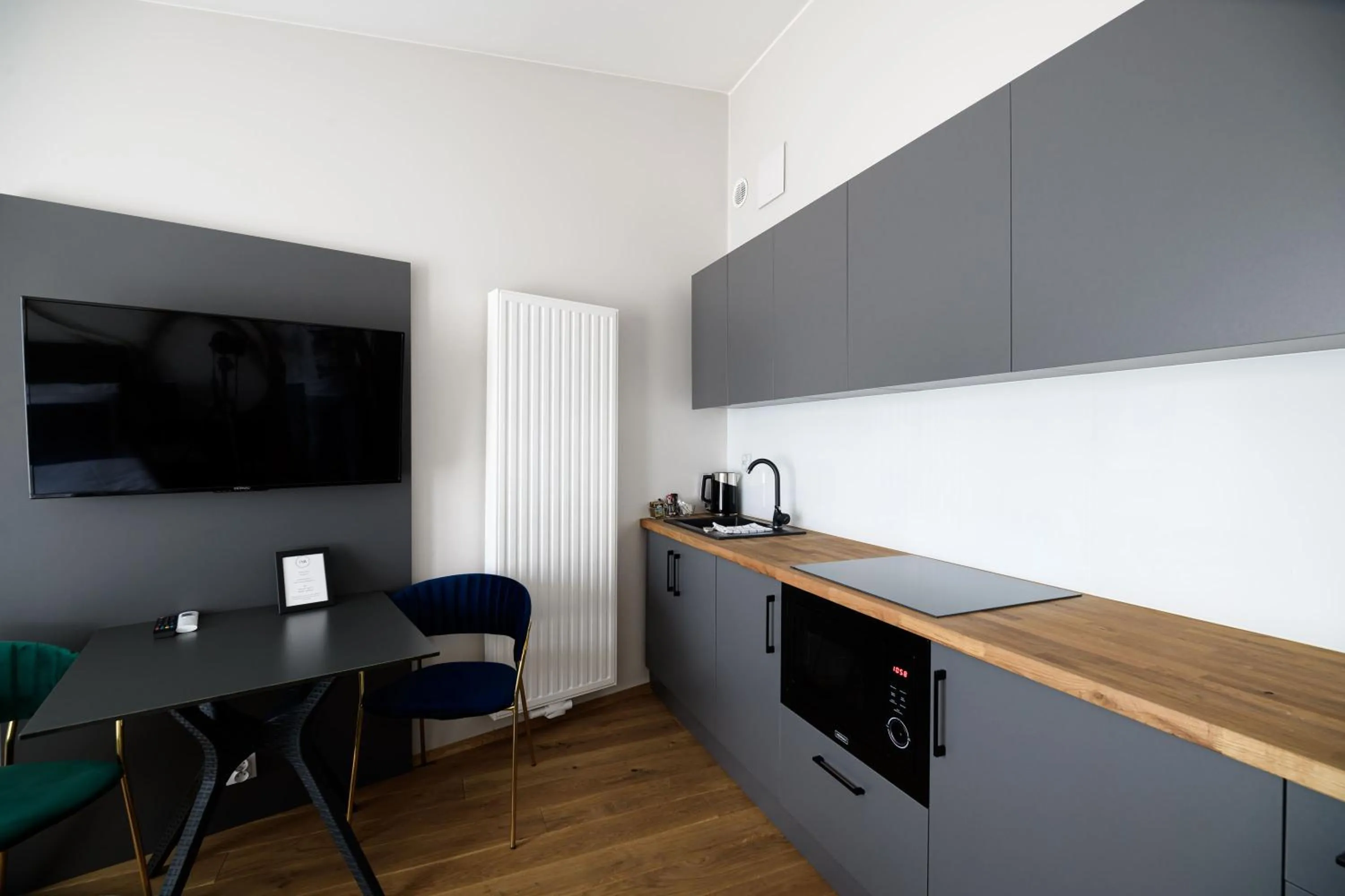 Kitchen or kitchenette in Aparthotel Inspire Miodova Residence