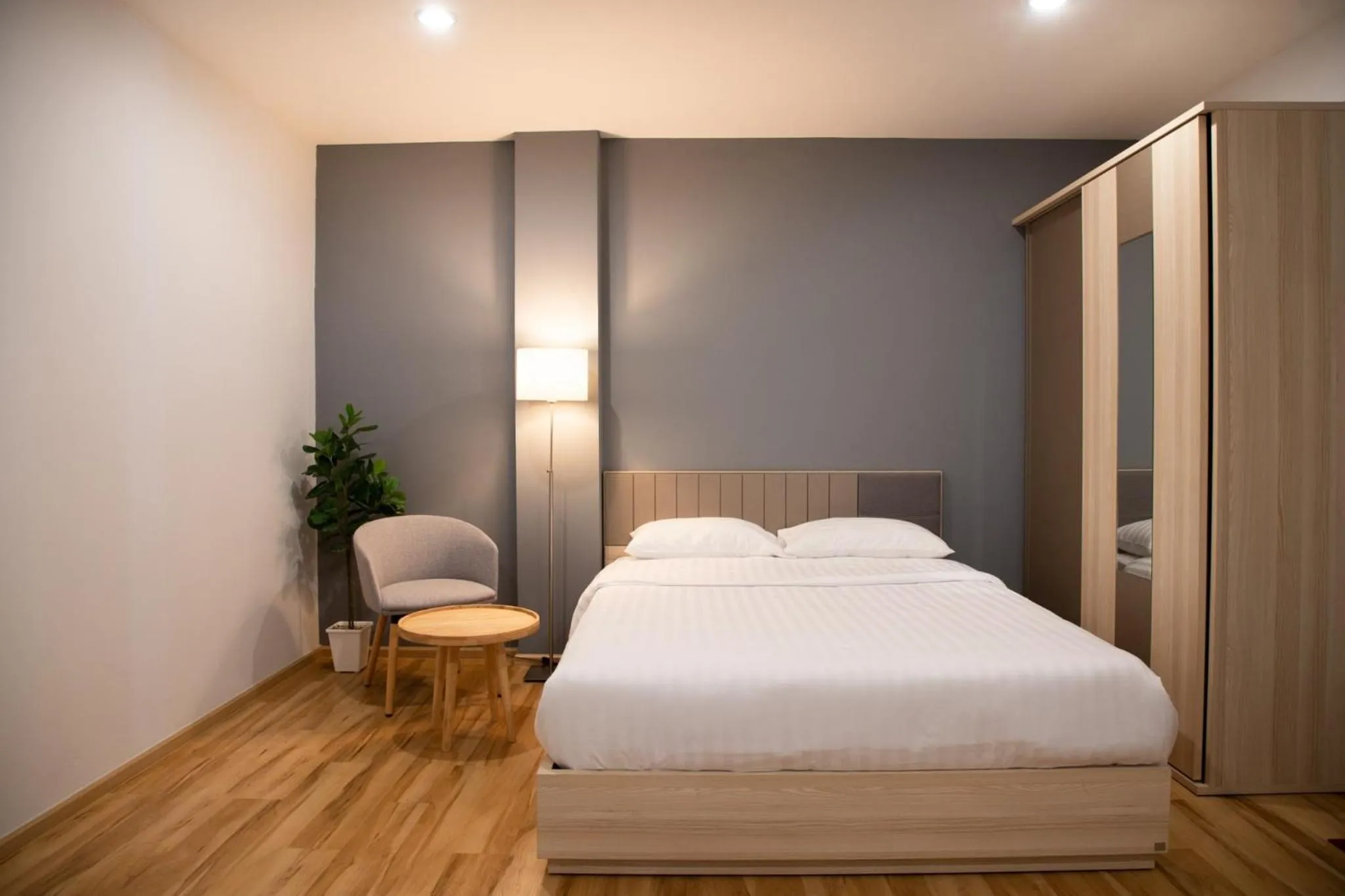 Bed in J & L Residence and Spa