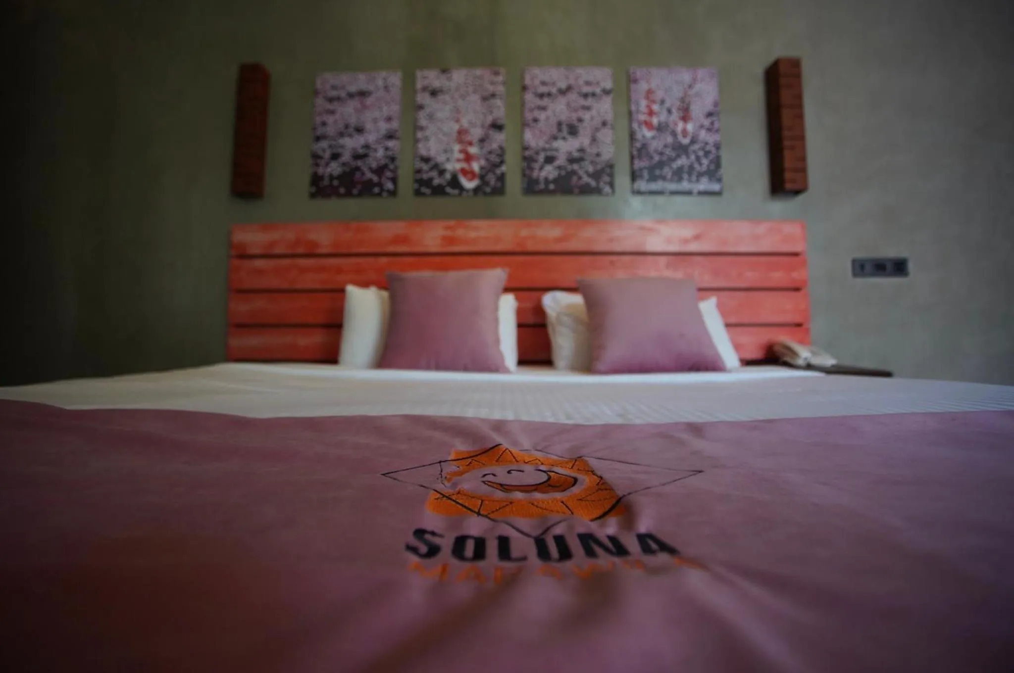 Bed in SOLUNA BEACH RESORT