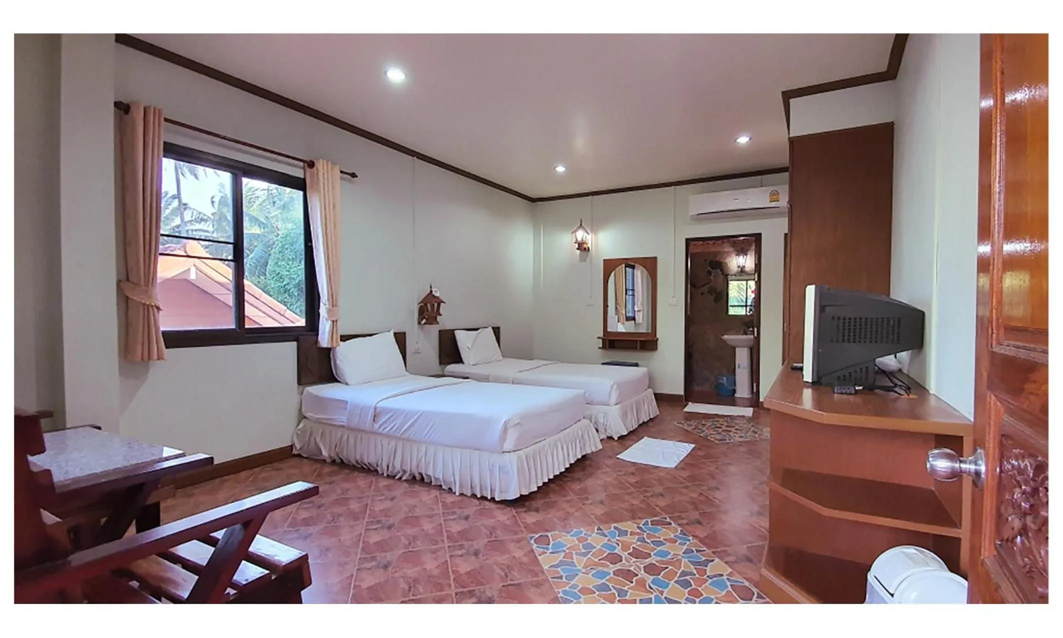 Photo of the whole room, Bed in TAWAN RESORT