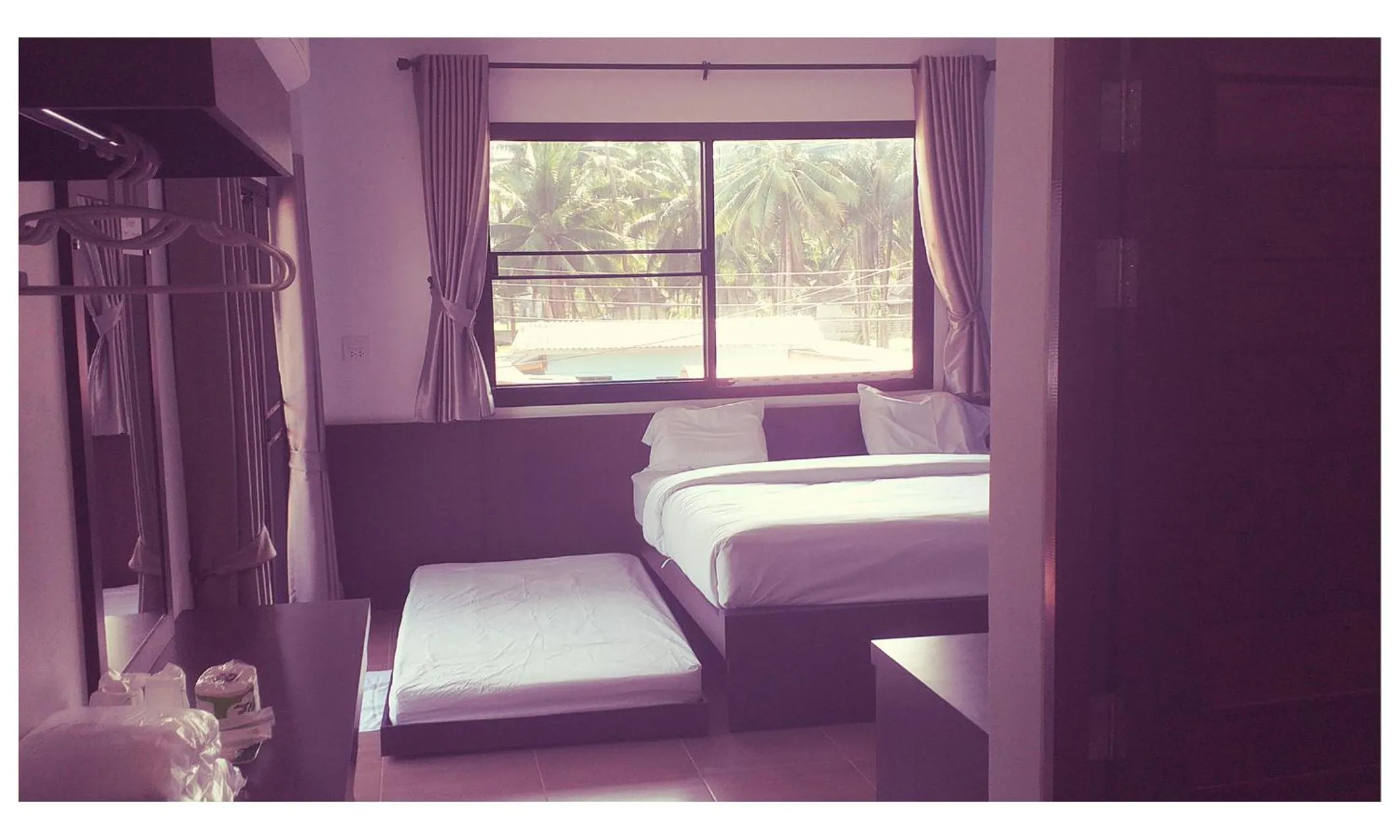 Bed in TAWAN RESORT