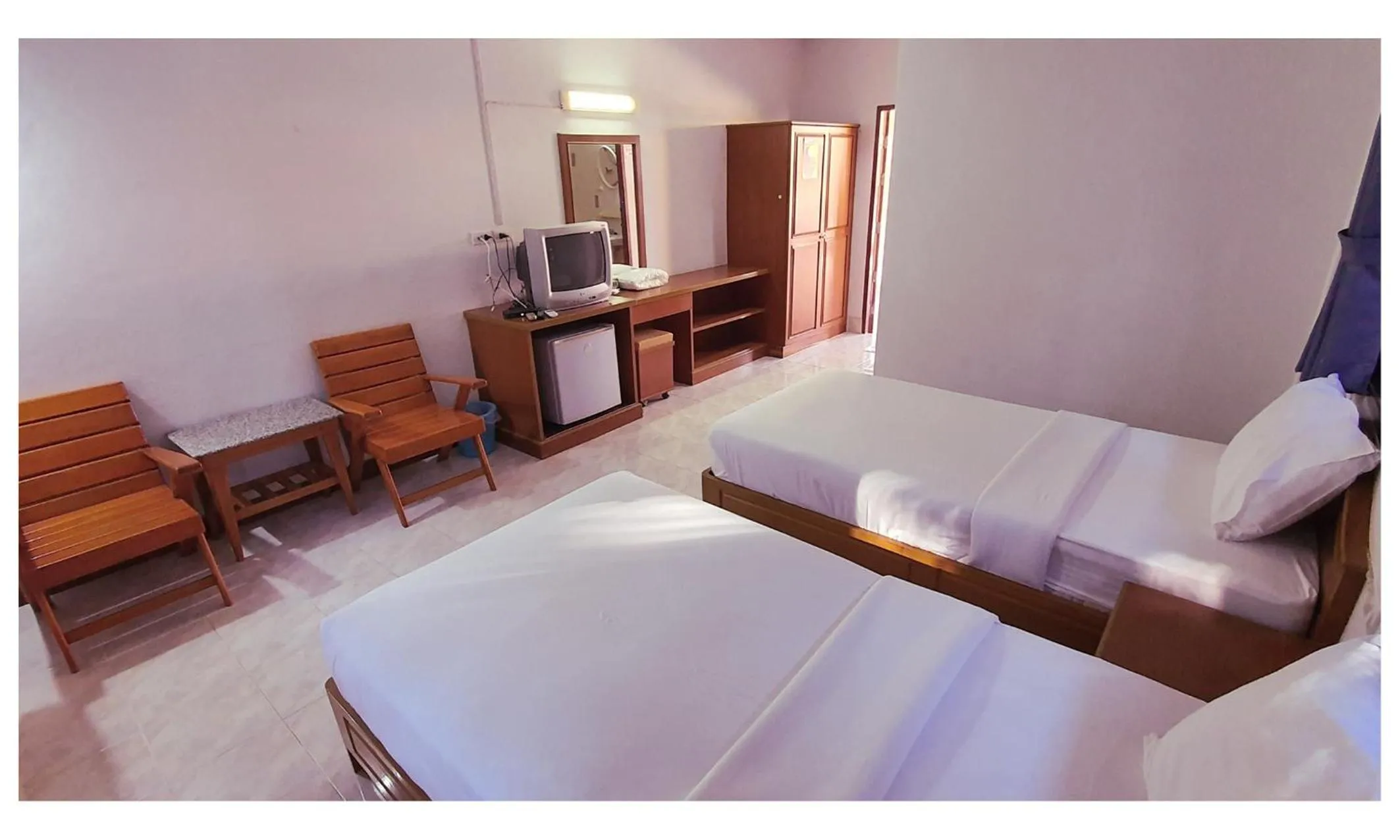 Photo of the whole room, Bed in TAWAN RESORT