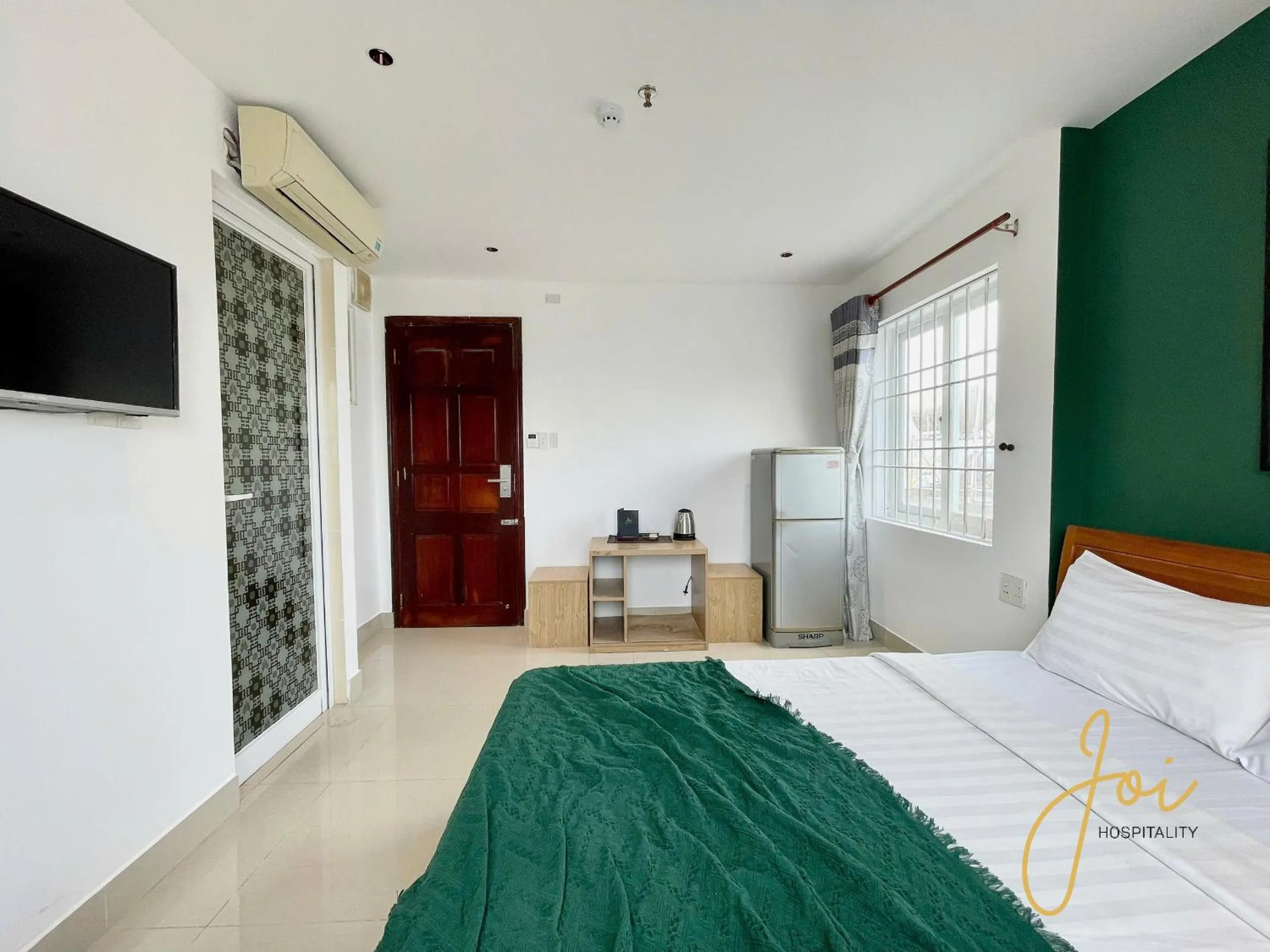 Bed in Joi Hospitality - Anthony