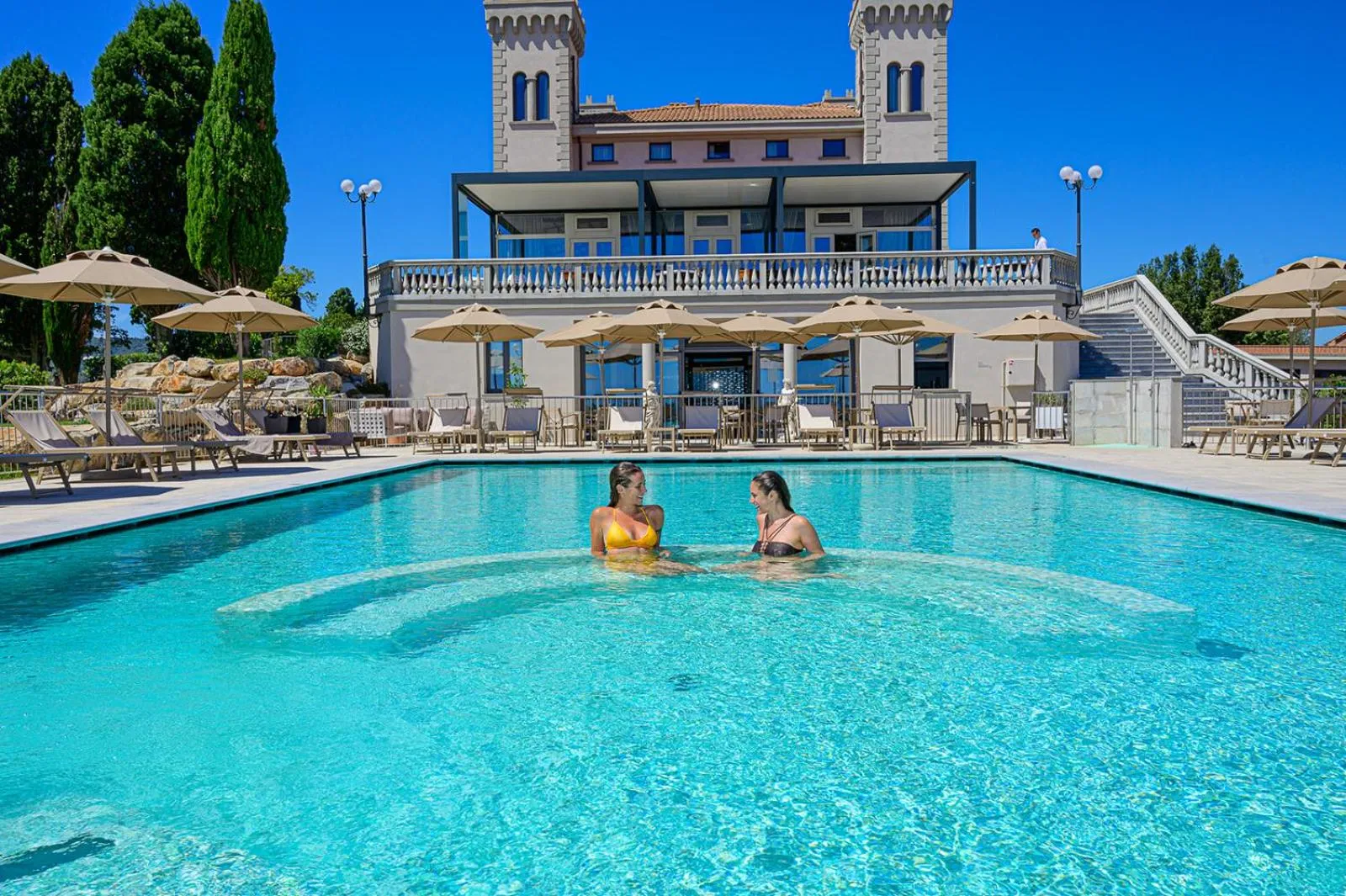Swimming pool in Castello Bonaria Wine & Spa Resort