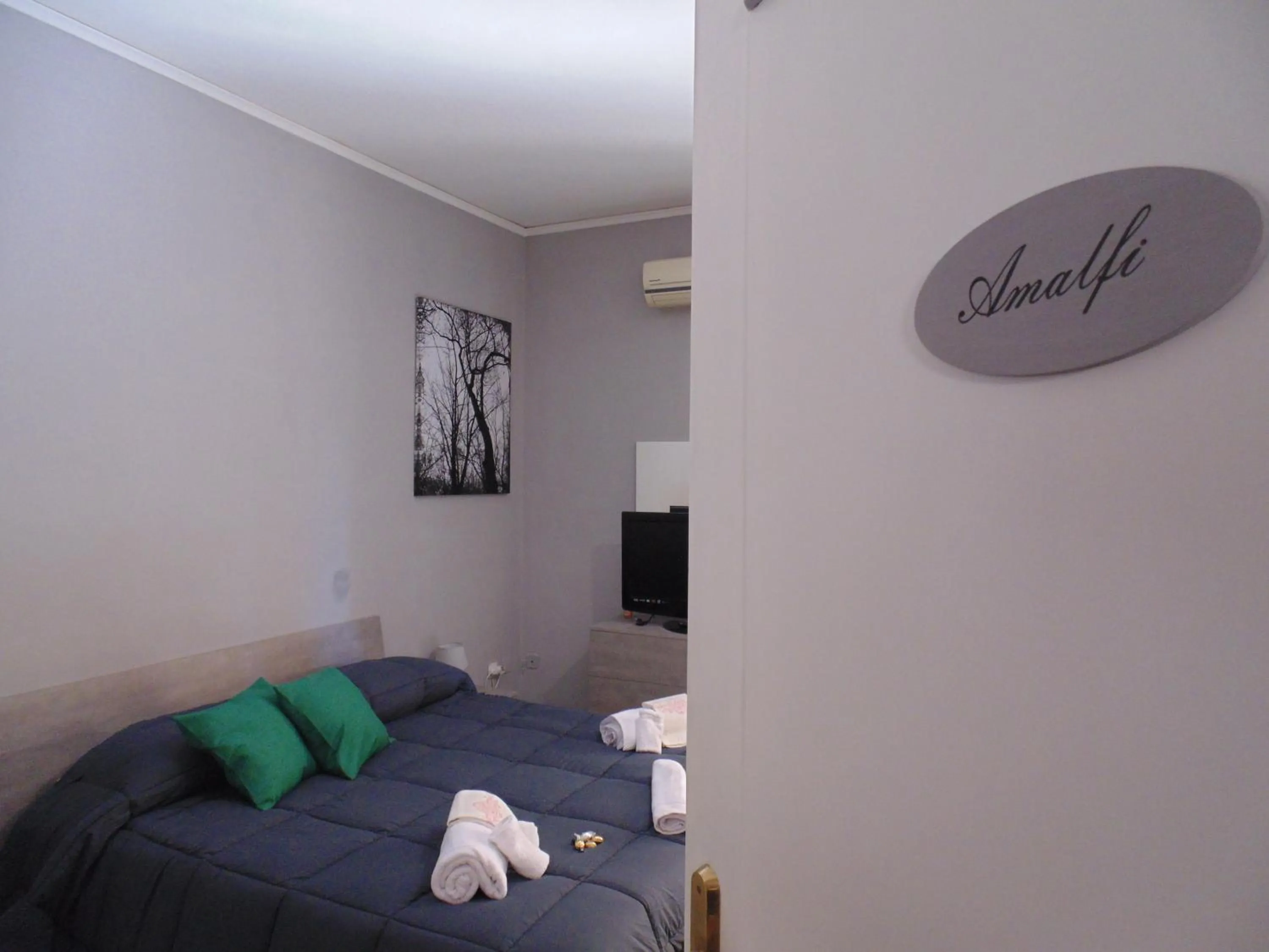 Bed in Parthenope rooms