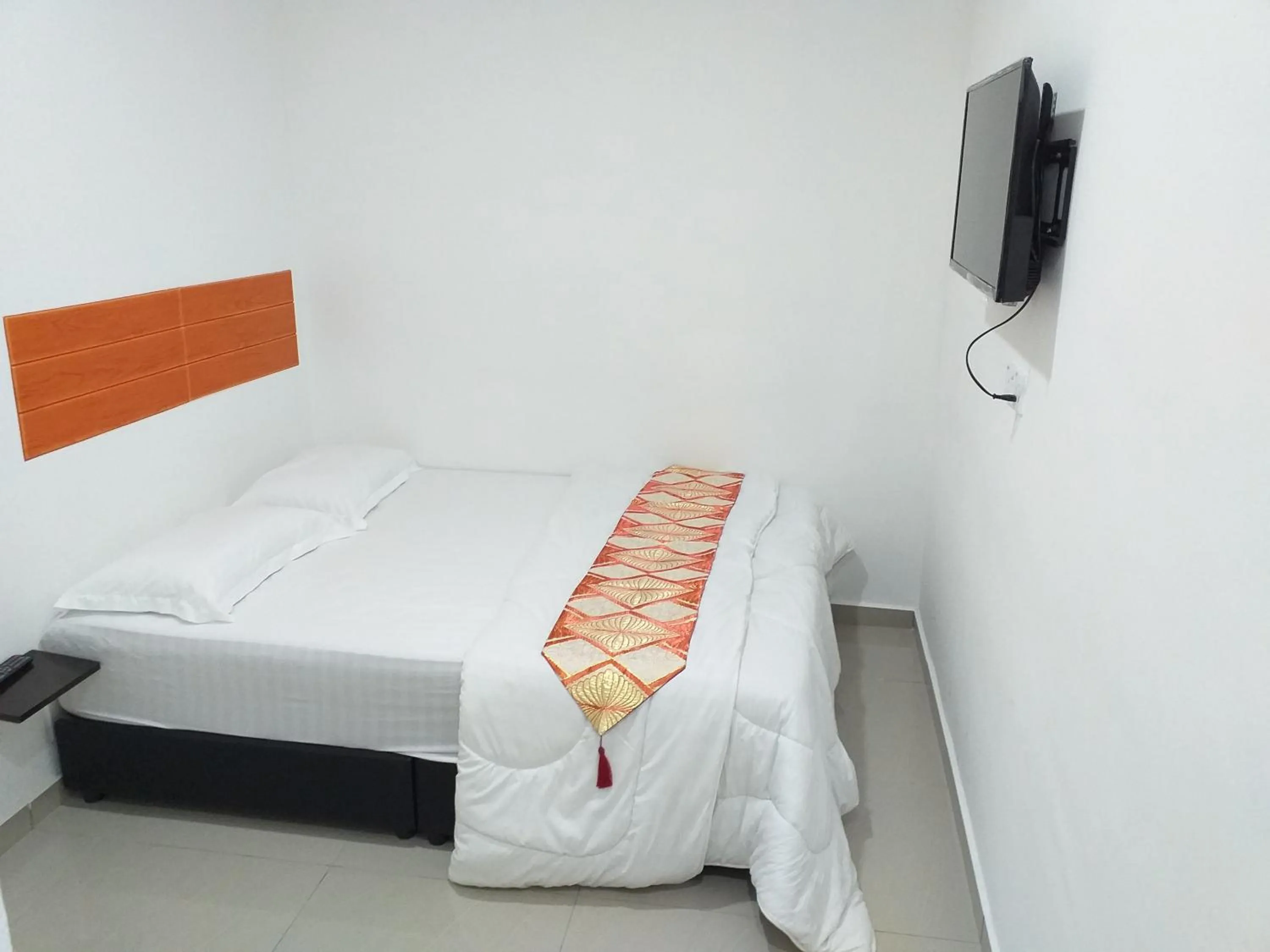 Bed in Orange Villa Hotel Near Palm Mall Seremban