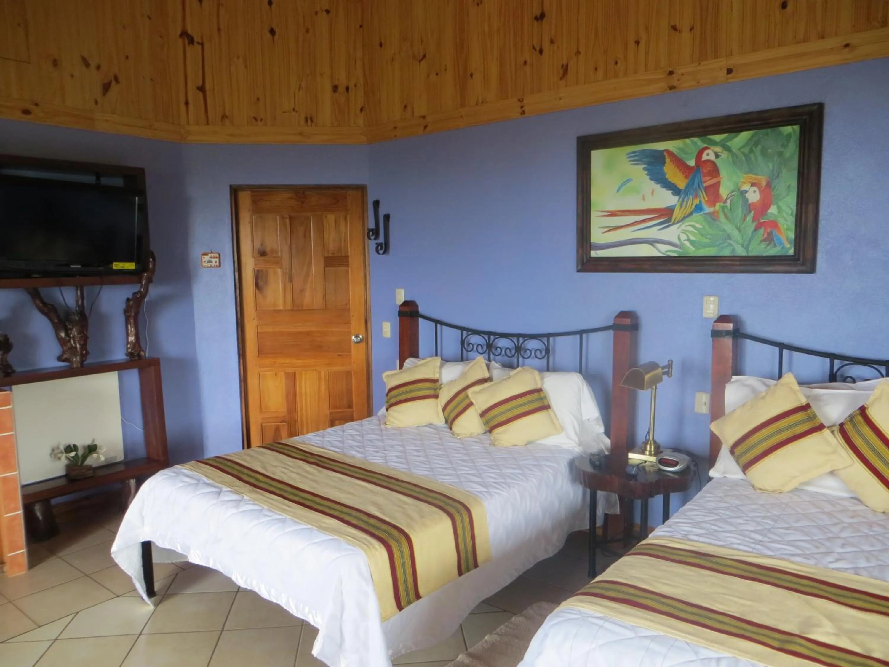 Bed in Guayabo Lodge
