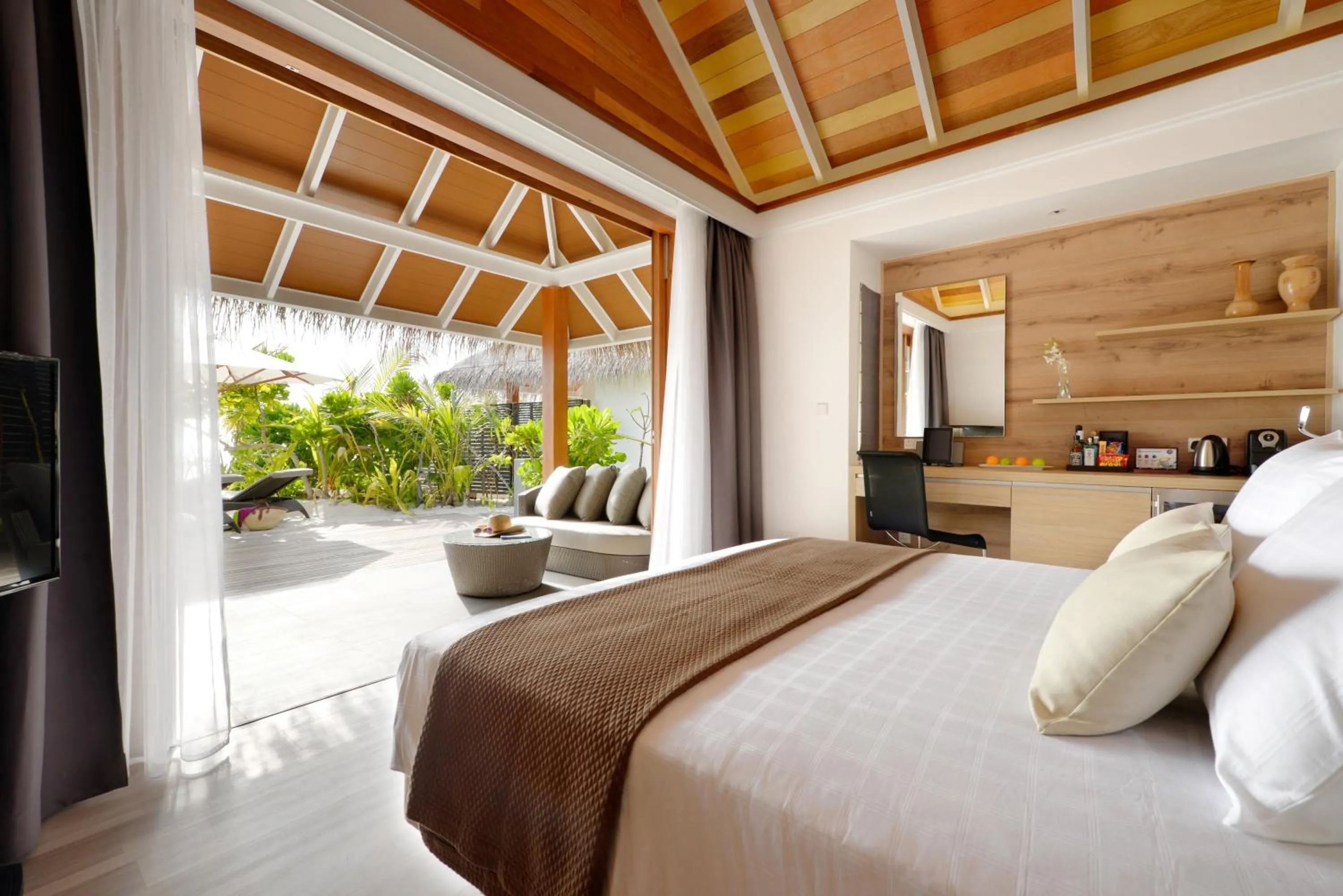 Bed in Kandolhu Maldives