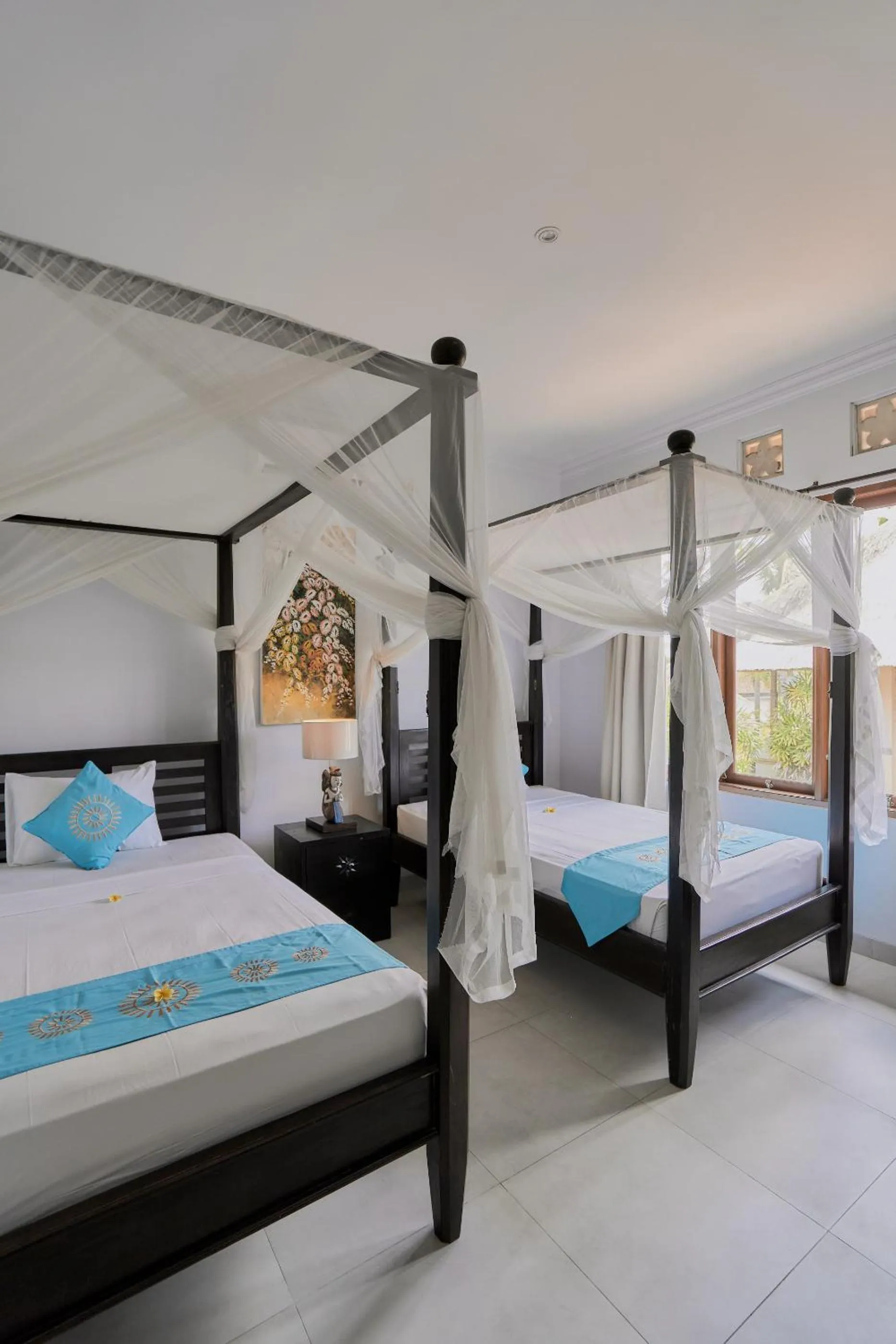 Bed in Sama's Cottages and Villas